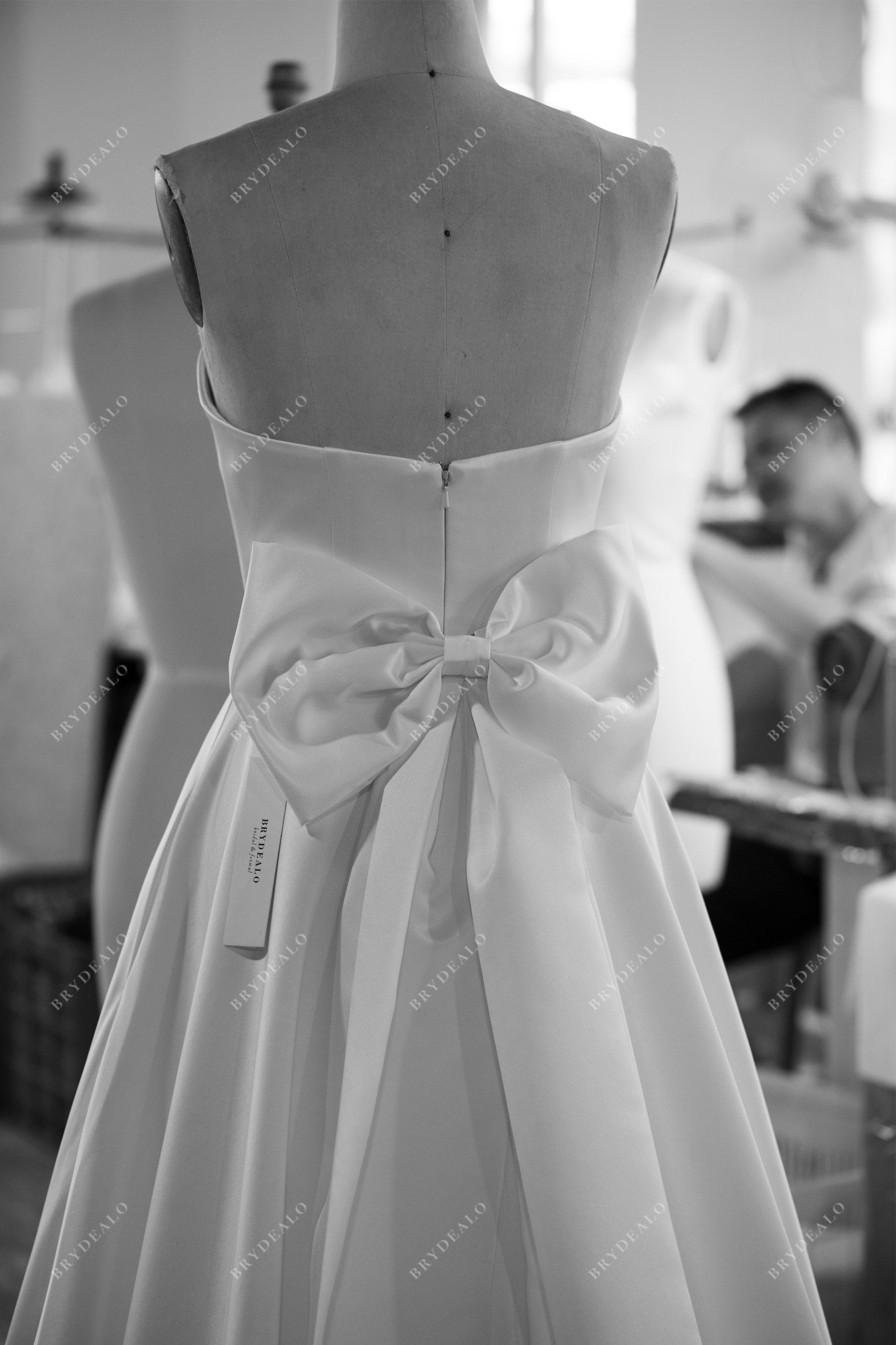 satin strapless wedding dress with bowknot