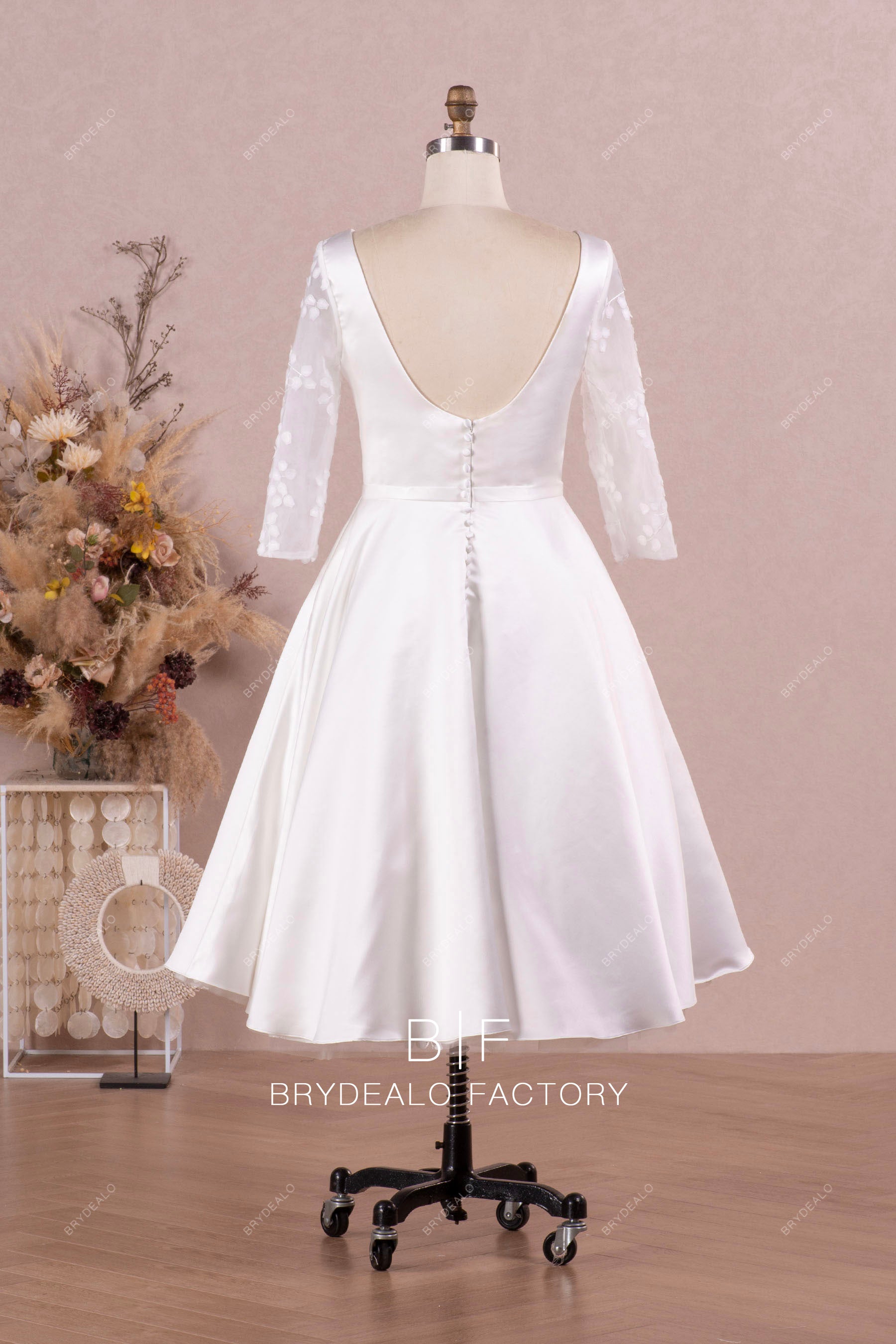 scoop back sleeved wedding dress