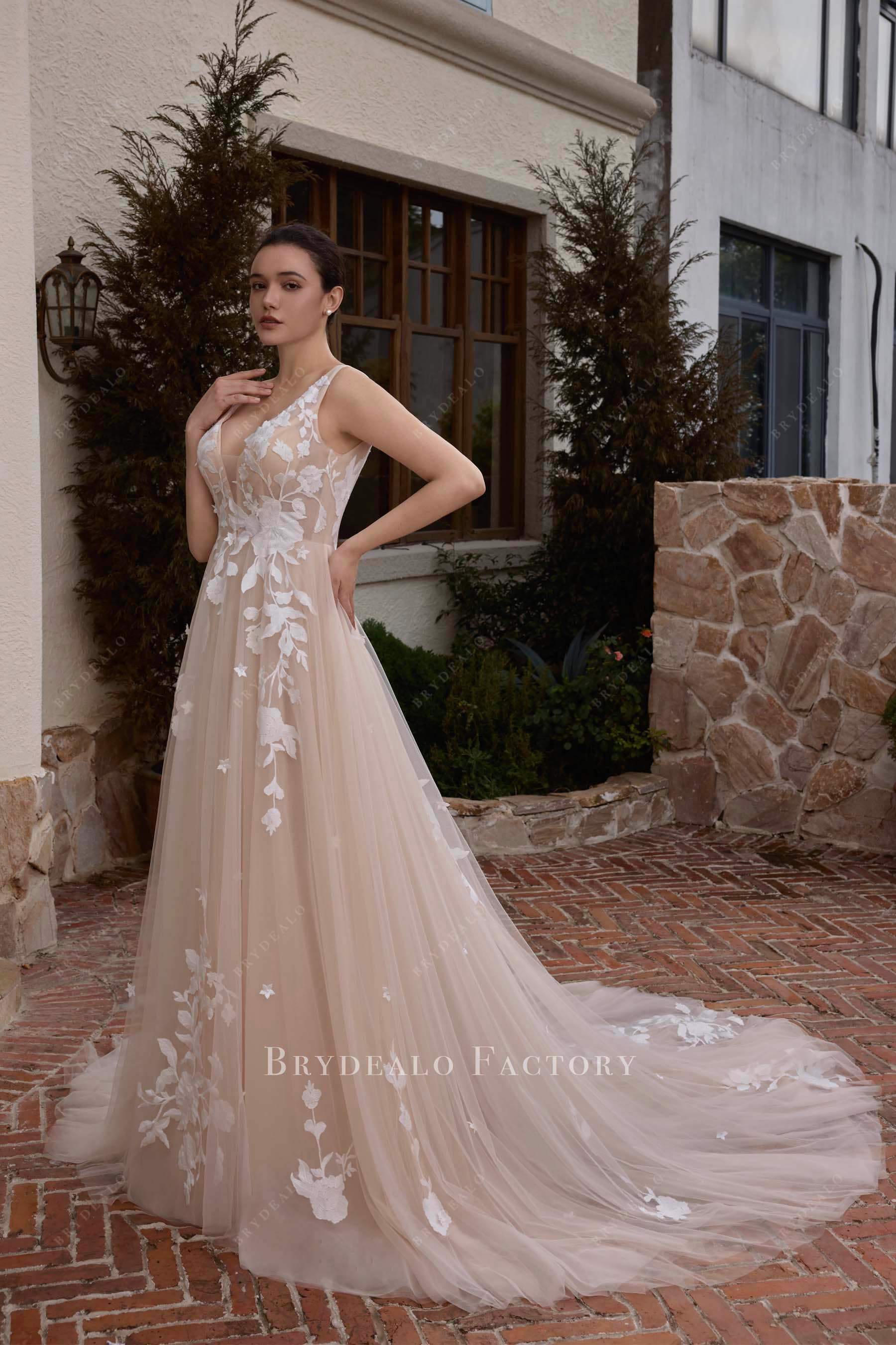 sheer lace train bridal gown