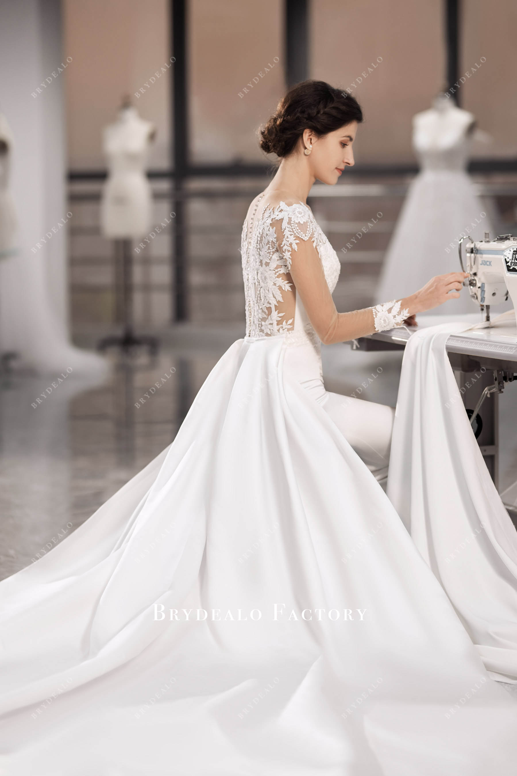 sleeved wedding dress with detachable overskirt