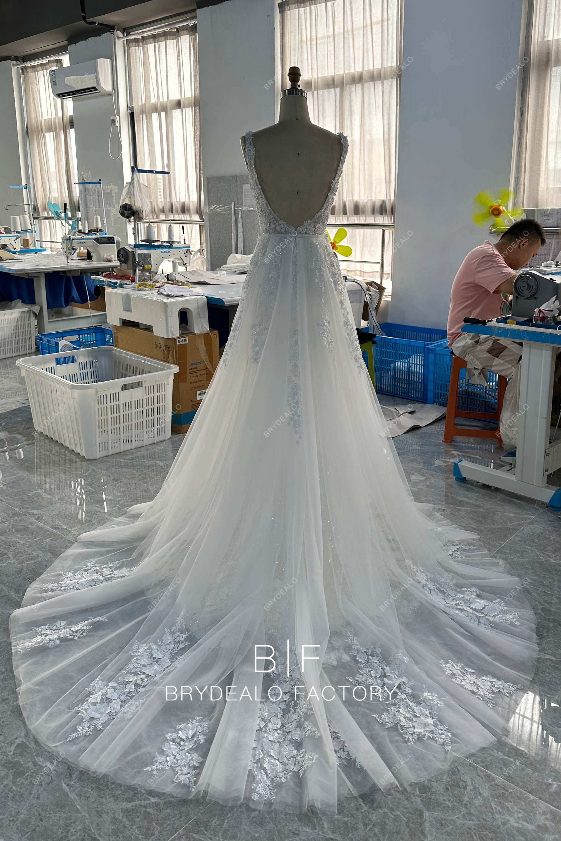 open back sleeveless A-line long train bridal gown