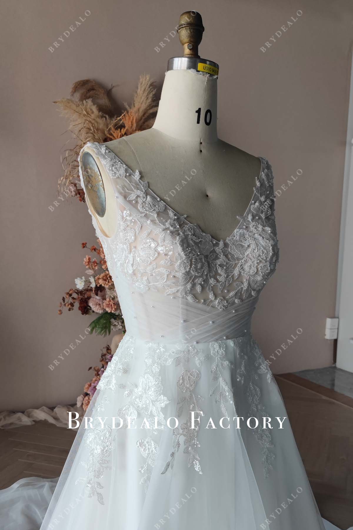 sleeveless crisscross pleated tulle wedding dress