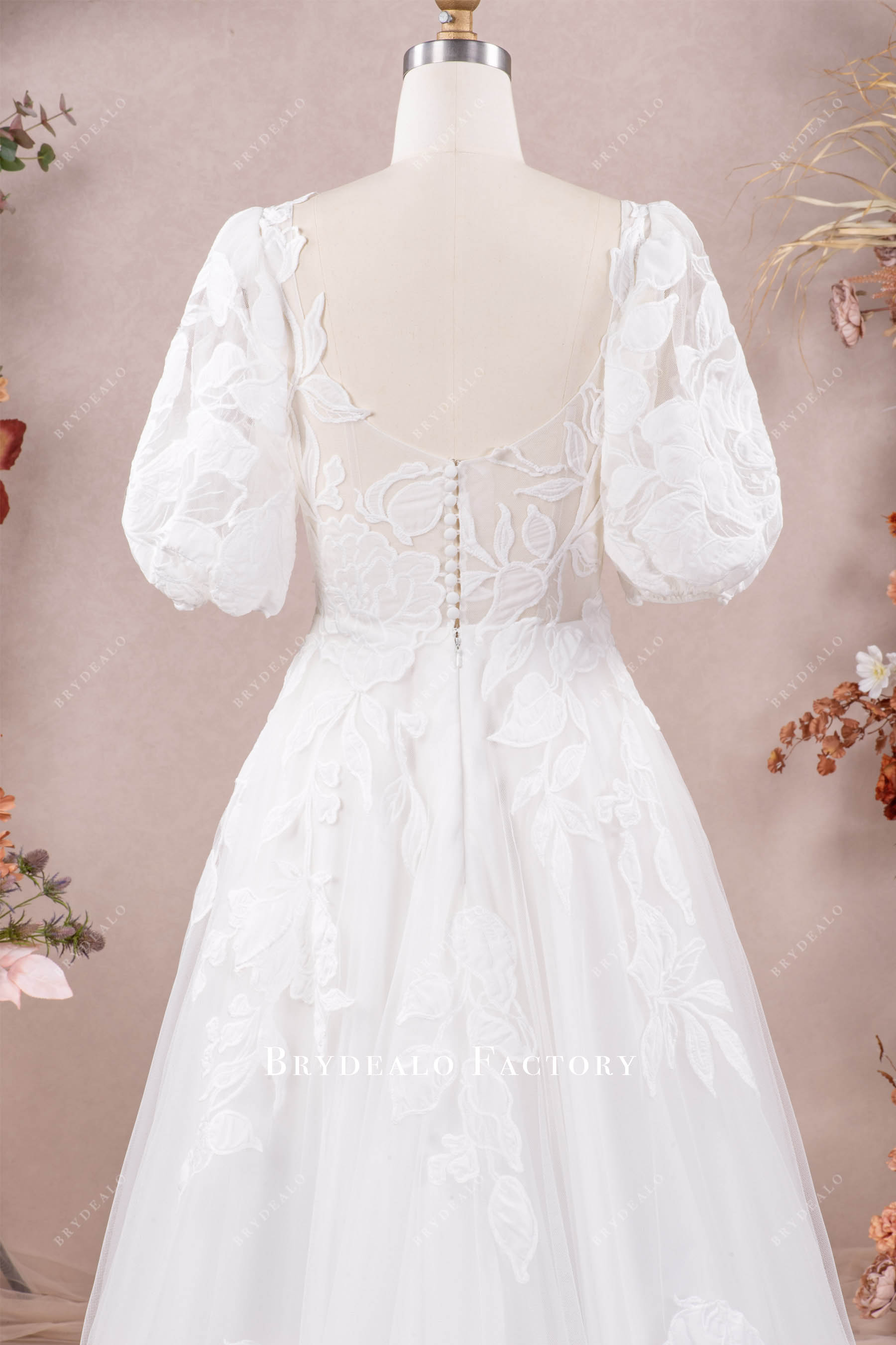 square back sleeved wedding dress