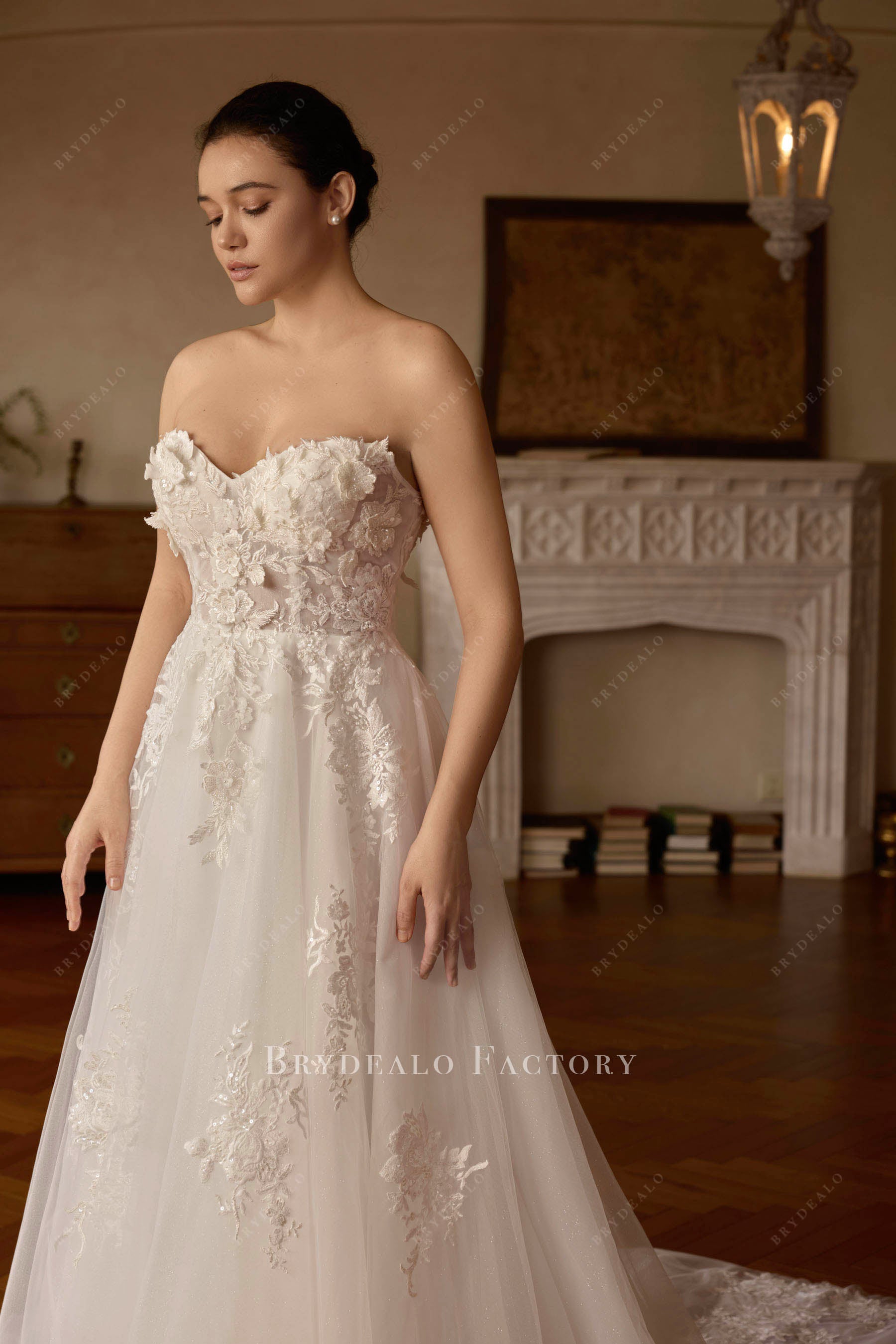 strapless beaded lace bridal gown