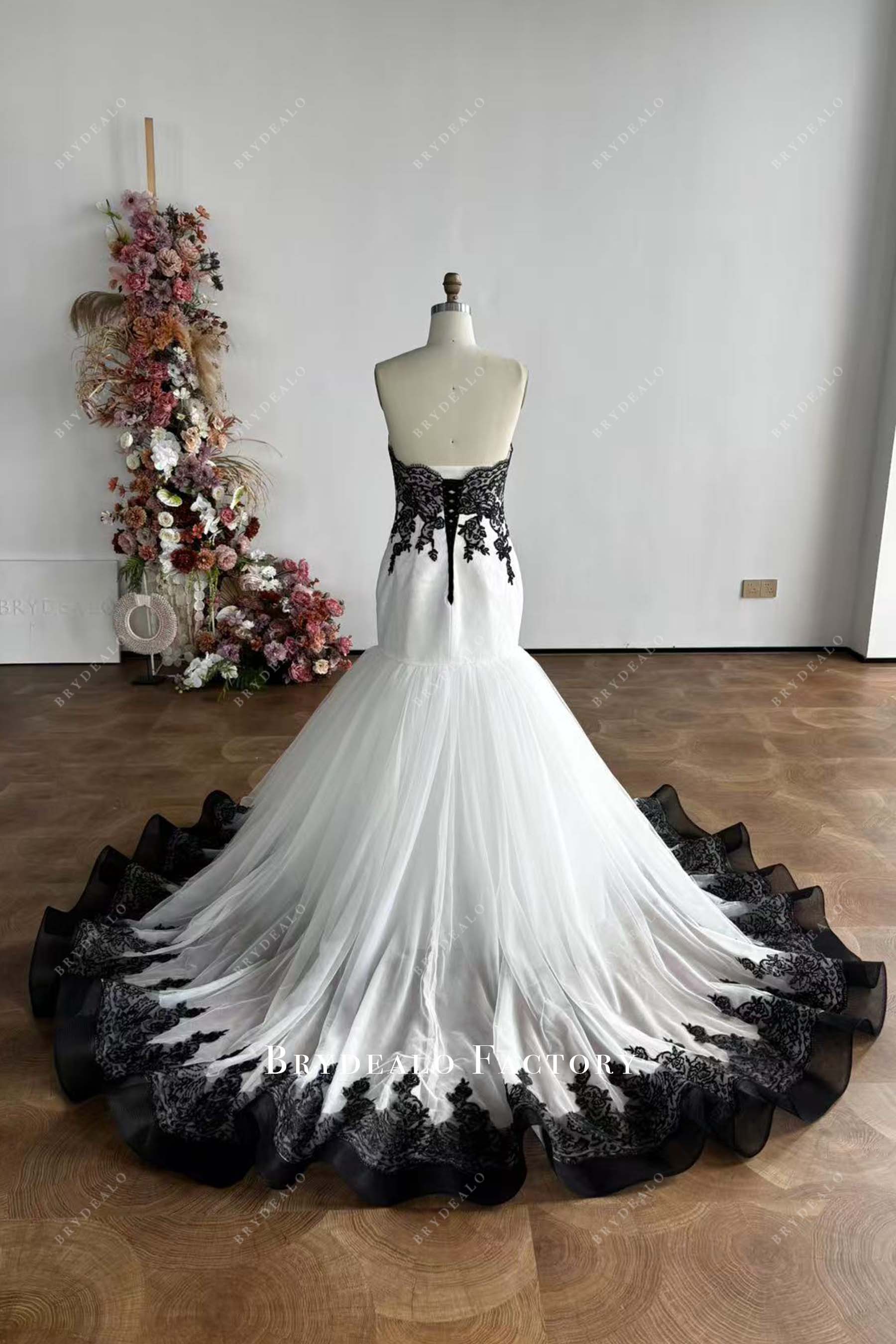 strapless black ruffled chapel train wedding dress