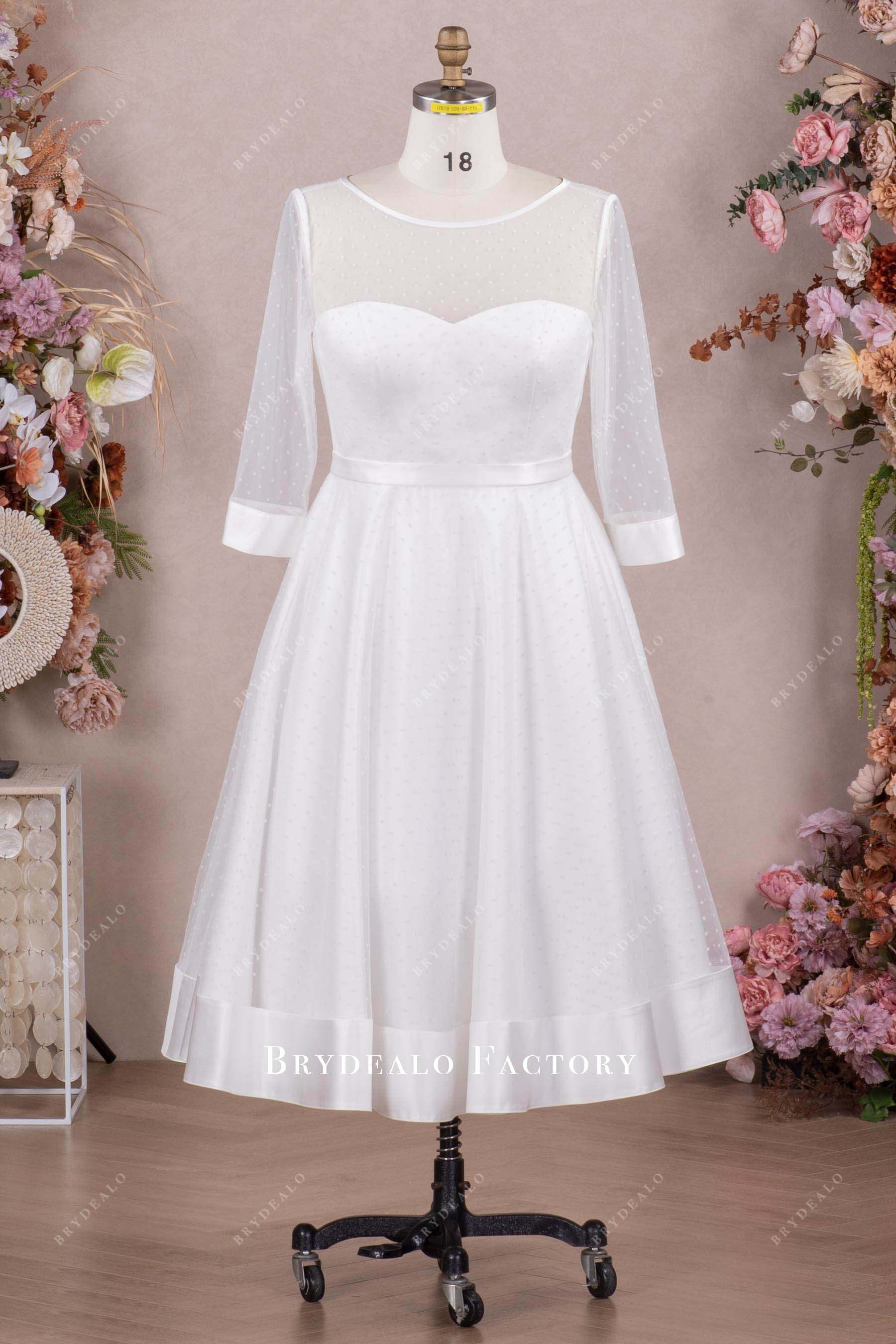 three-quarter length short wedding dress