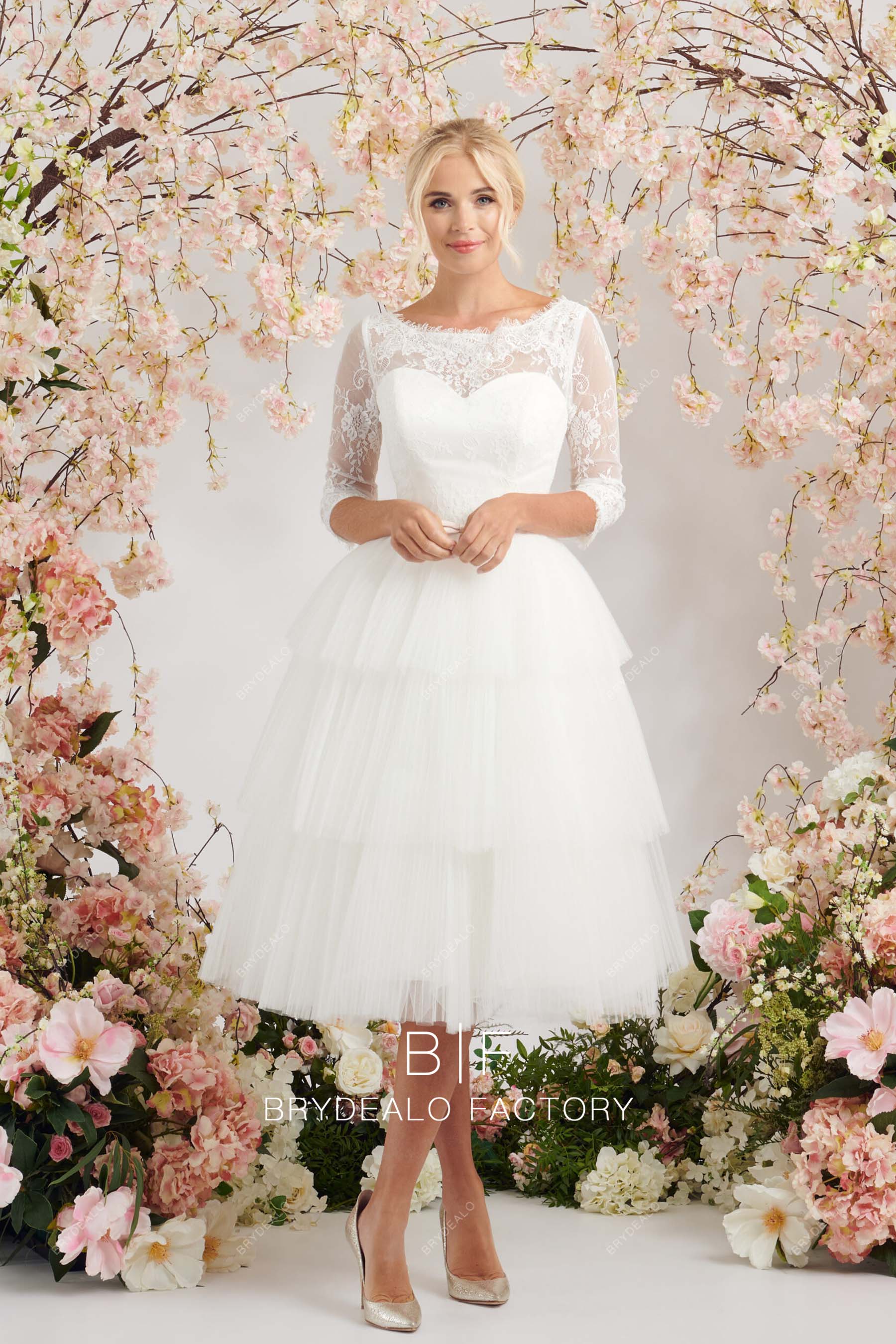 tiered pleated tulle A-line bateau neck bridal dress