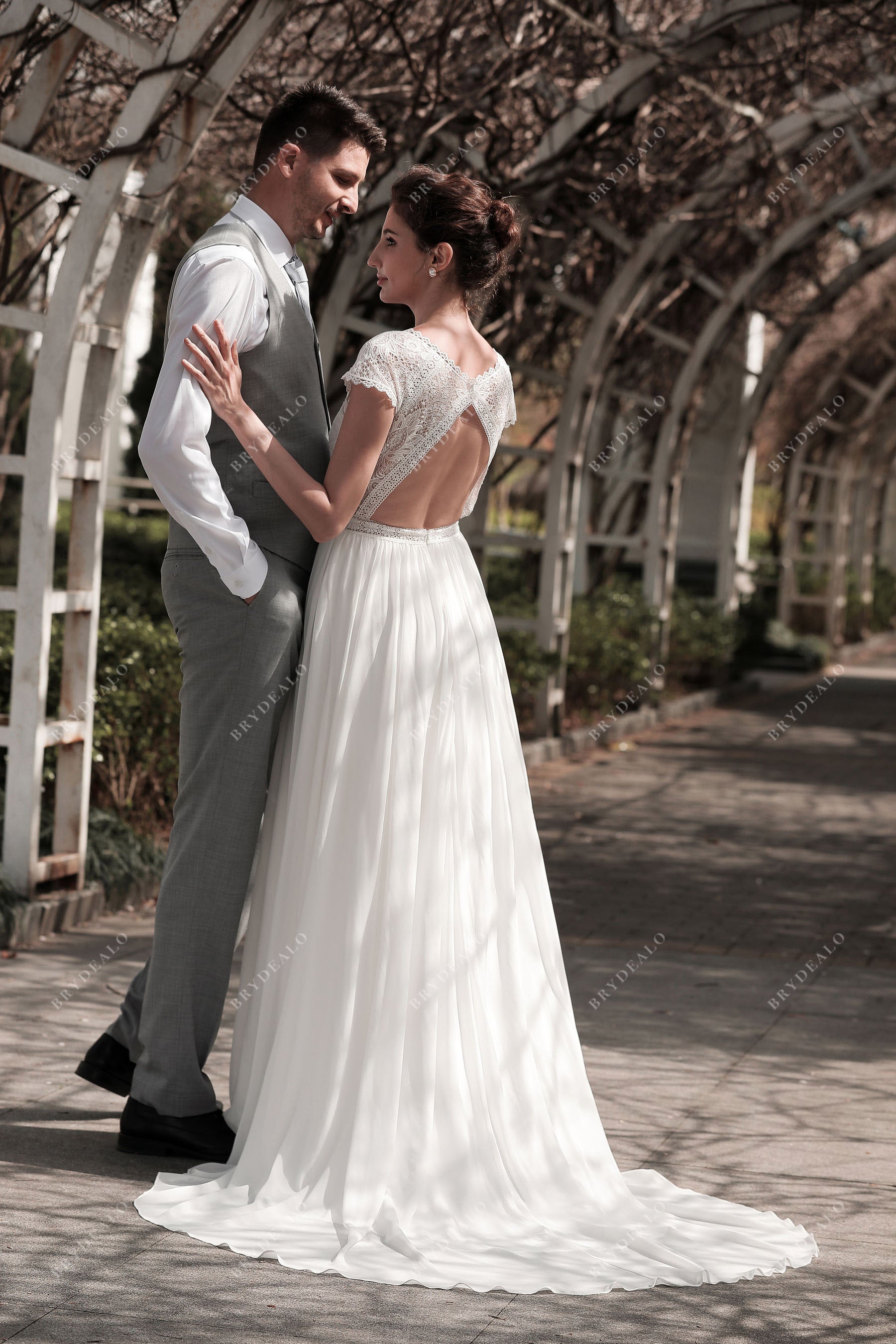 keyhole back cap sleeves wedding gown