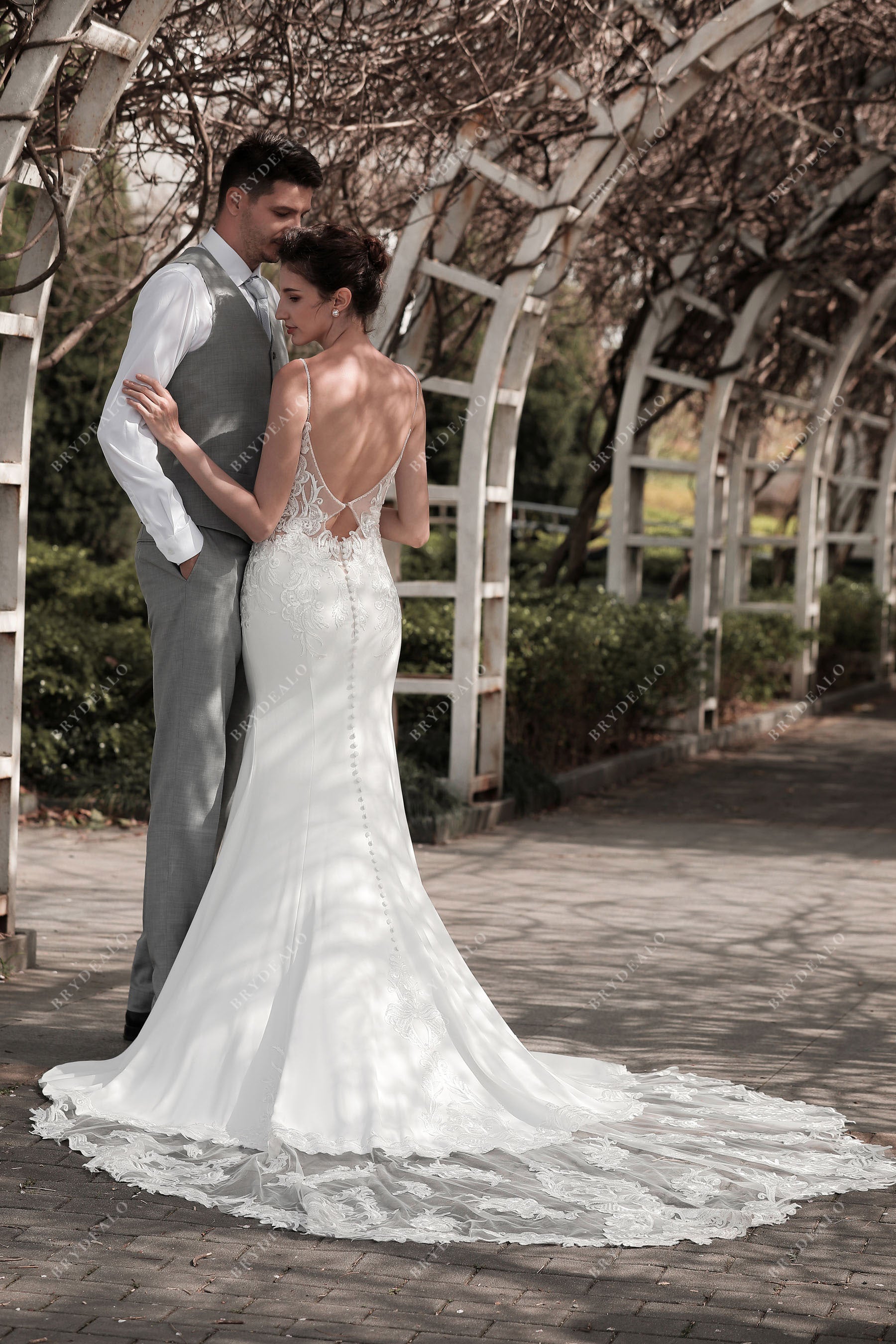 flattering lace crepe long mermaid bridal gown with long train