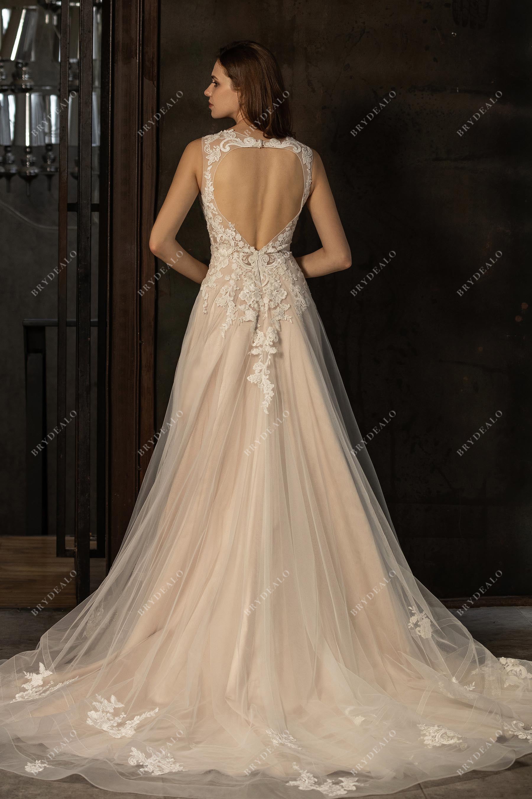 heart shaped open back lace ruffled tulle bridal gown