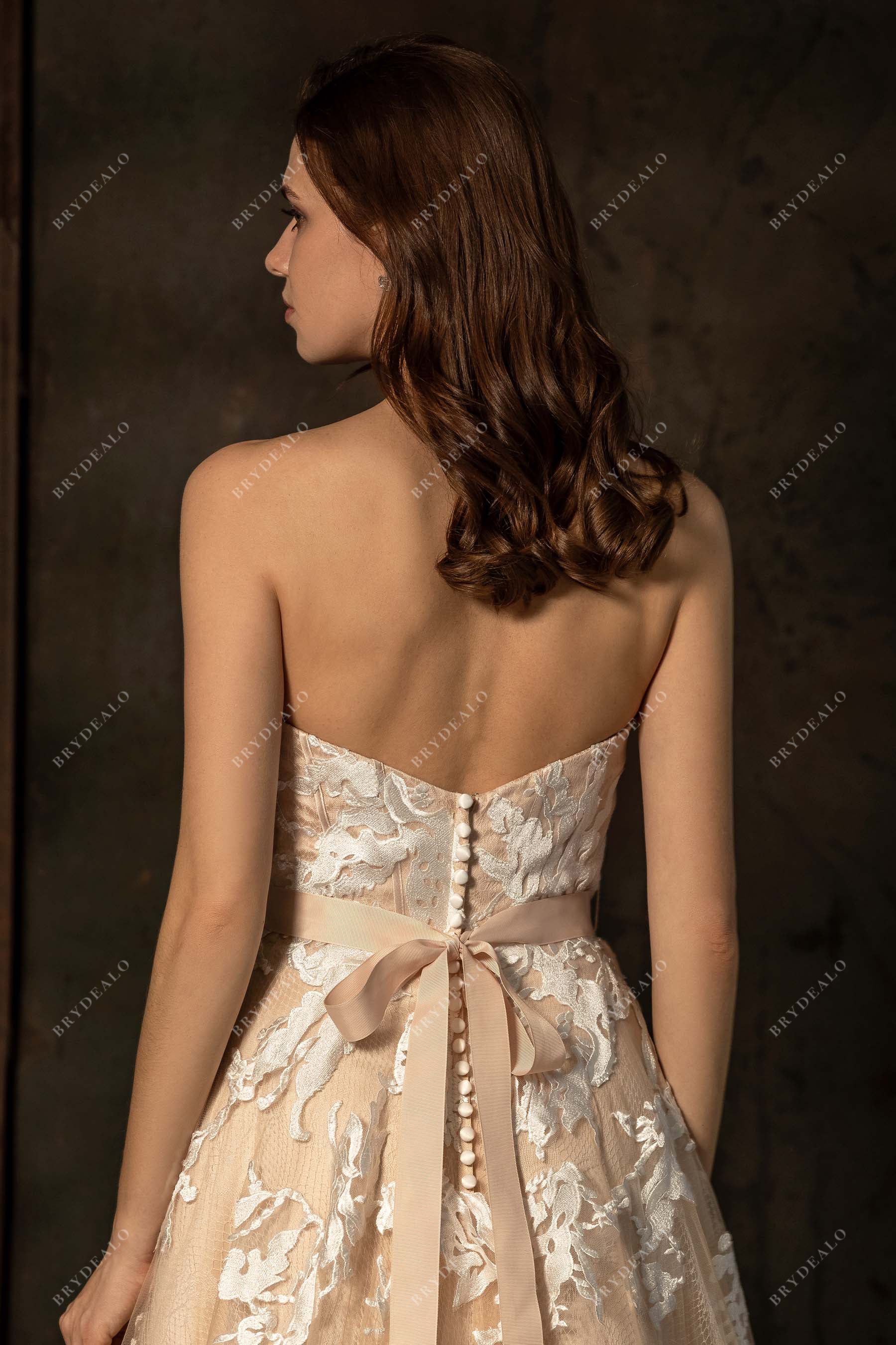 ivory lace overlaid crema tulle strapless wedding dress