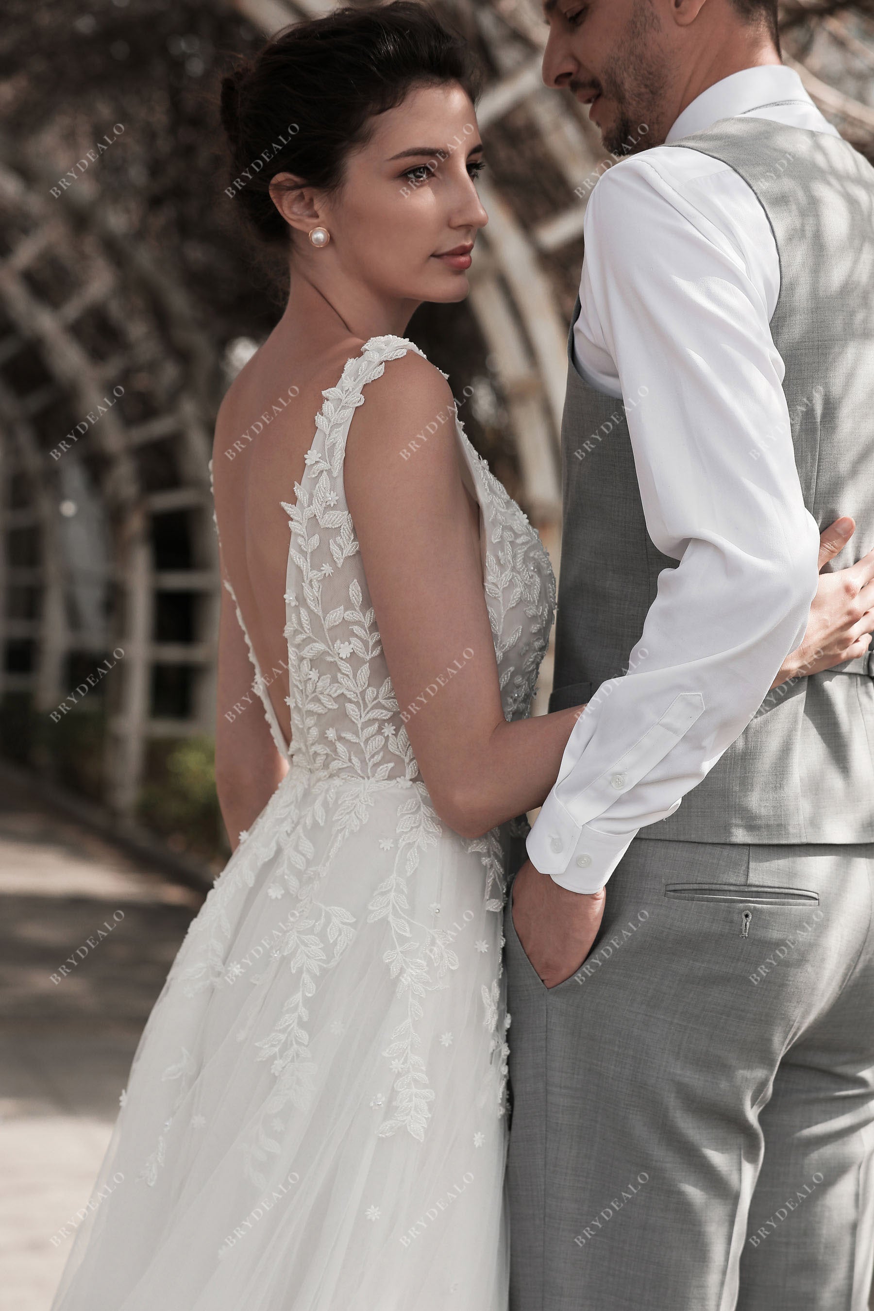 sleeveless lace V-back wedding gown