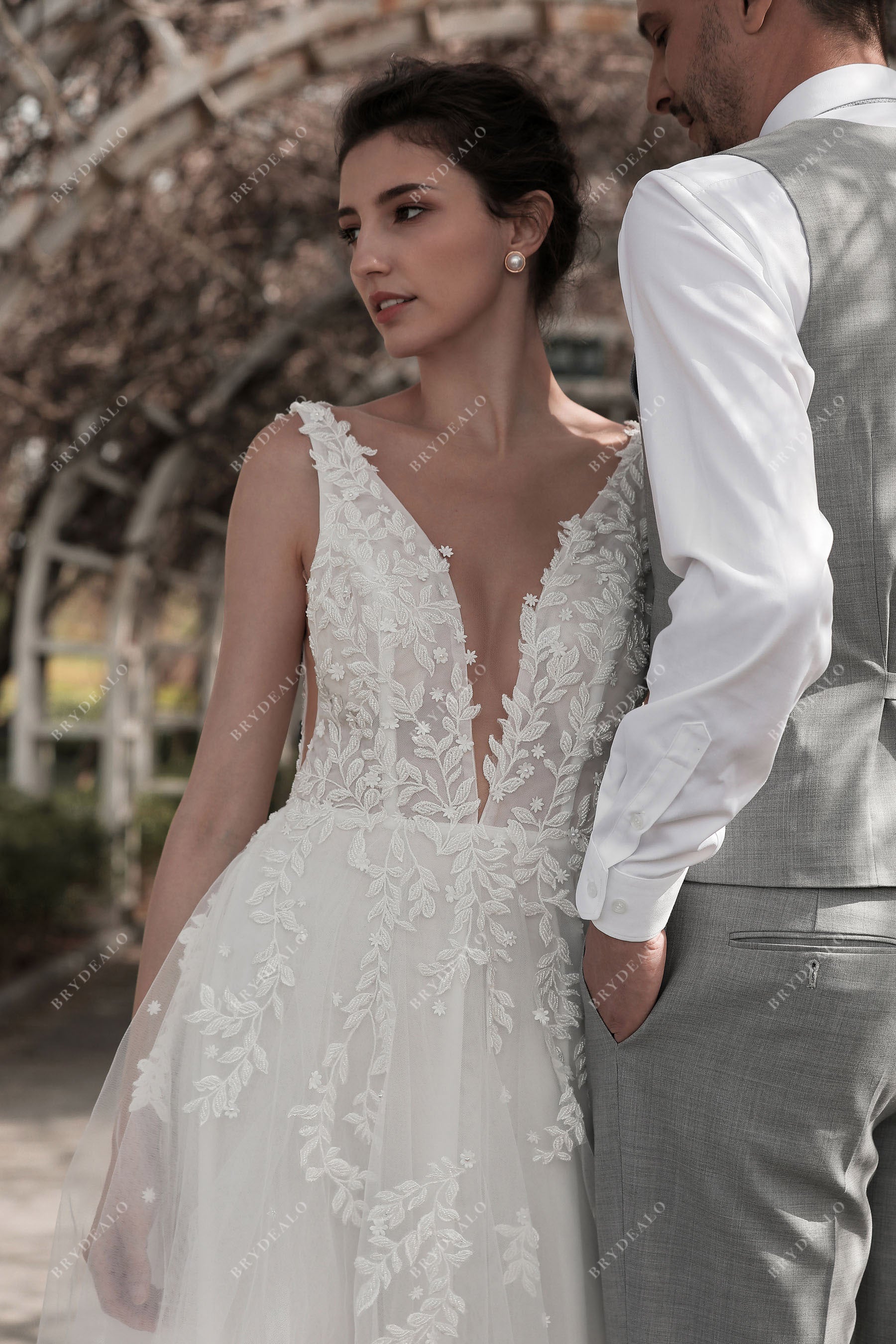 plunging neck lace wedding gown