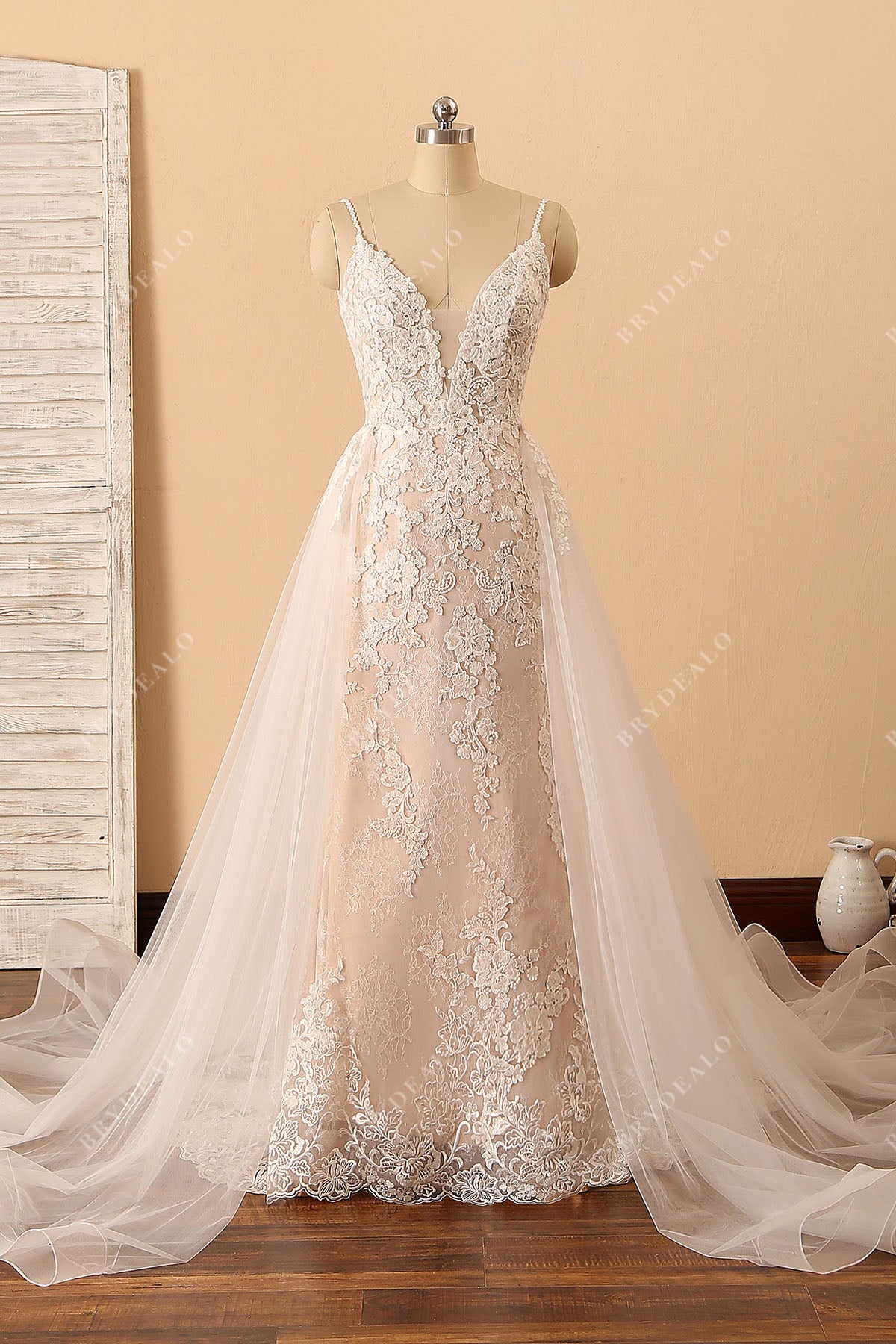 plunging neck lace godet bridal gown with overskirt