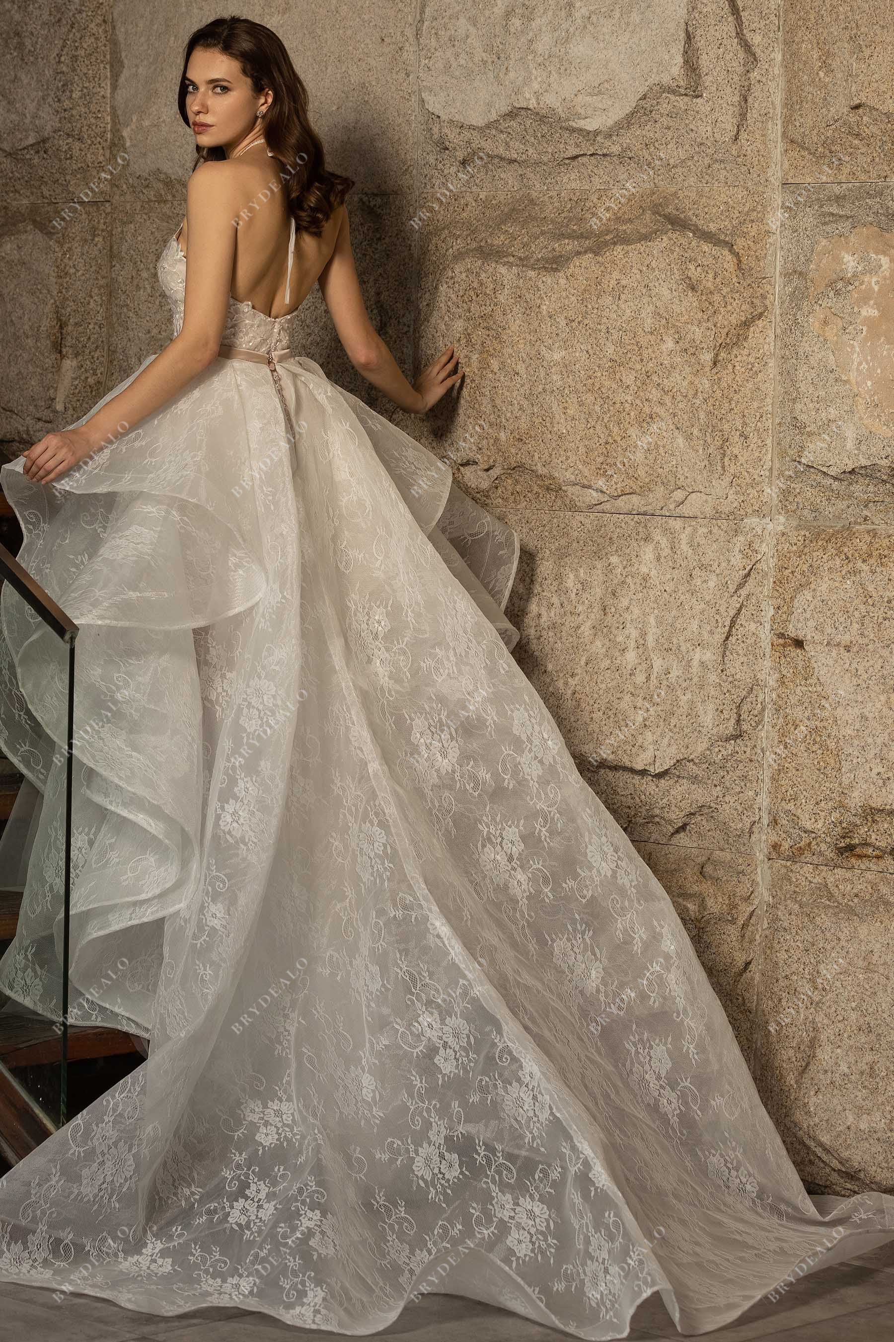 structured ruffled lace chapel train overskirt open back wedding gown