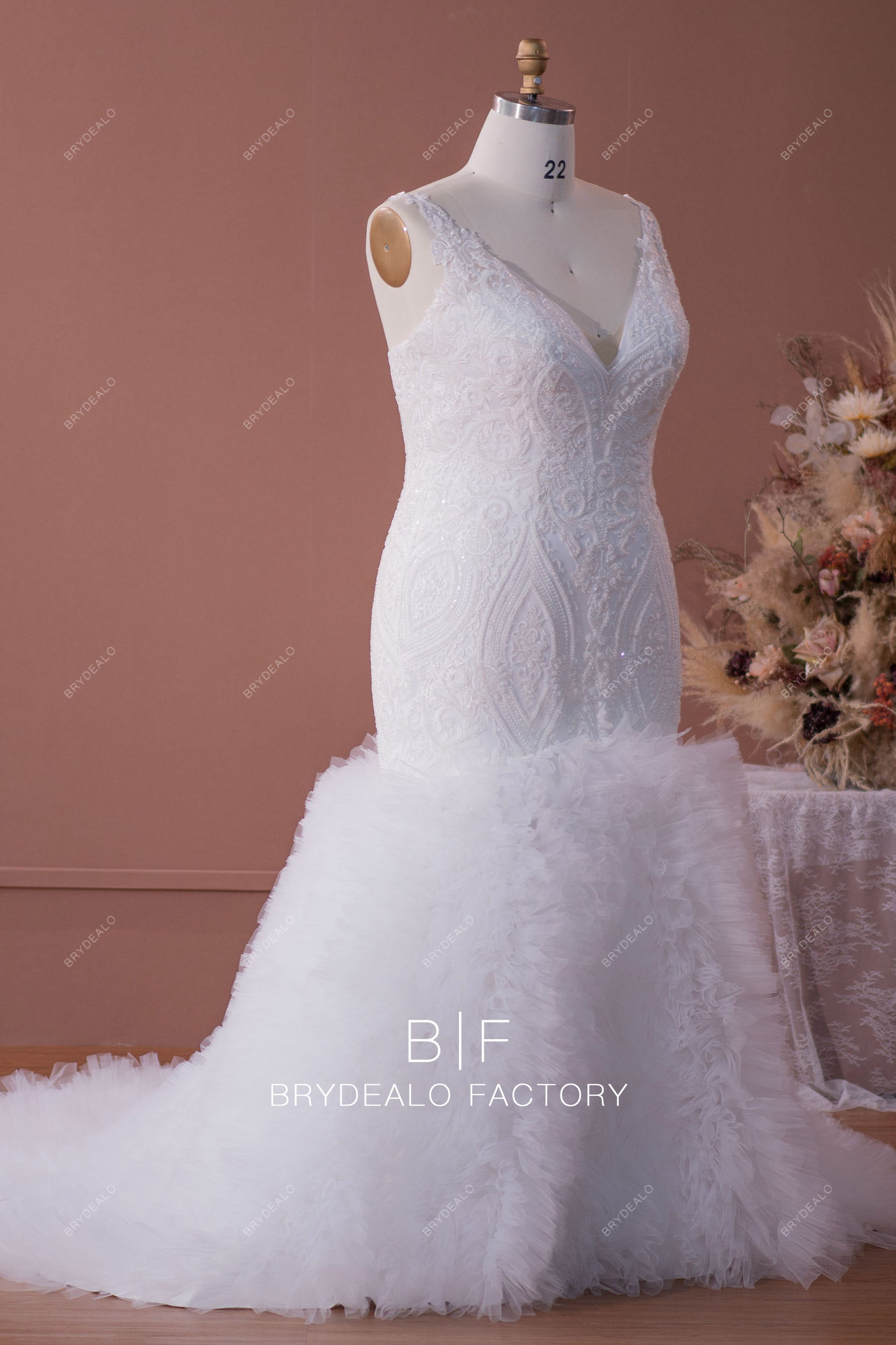 beaded patterned lace trumpet wedding gown
