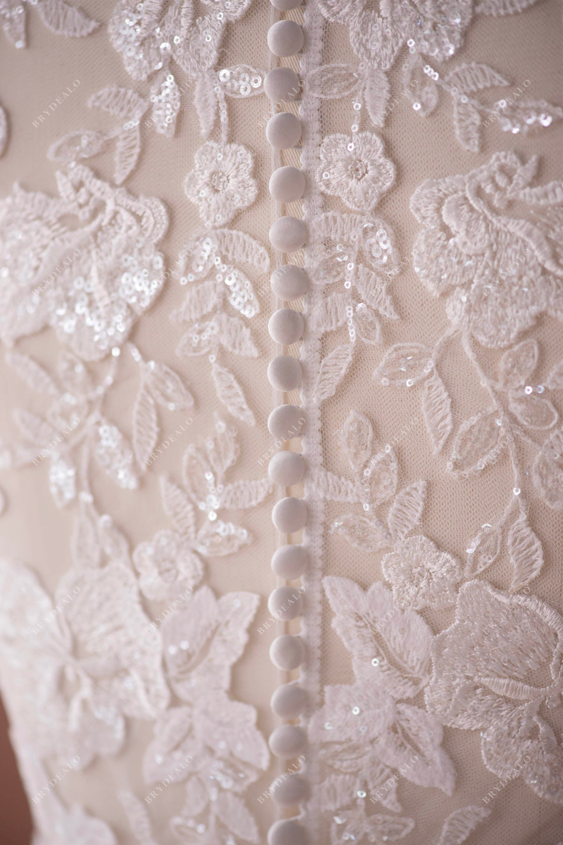 buttoned back closure wedding dress