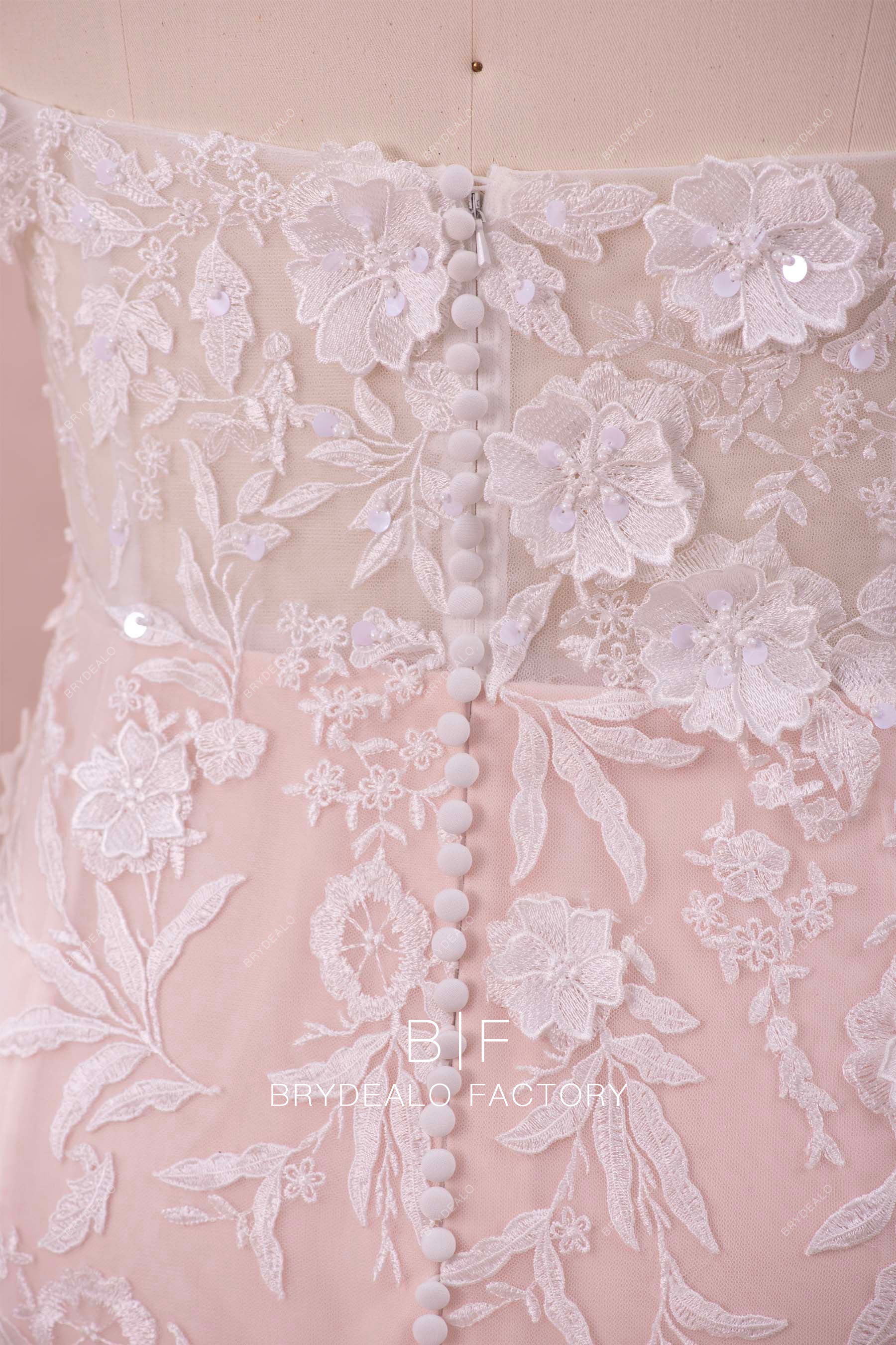 buttoned back wedding dress