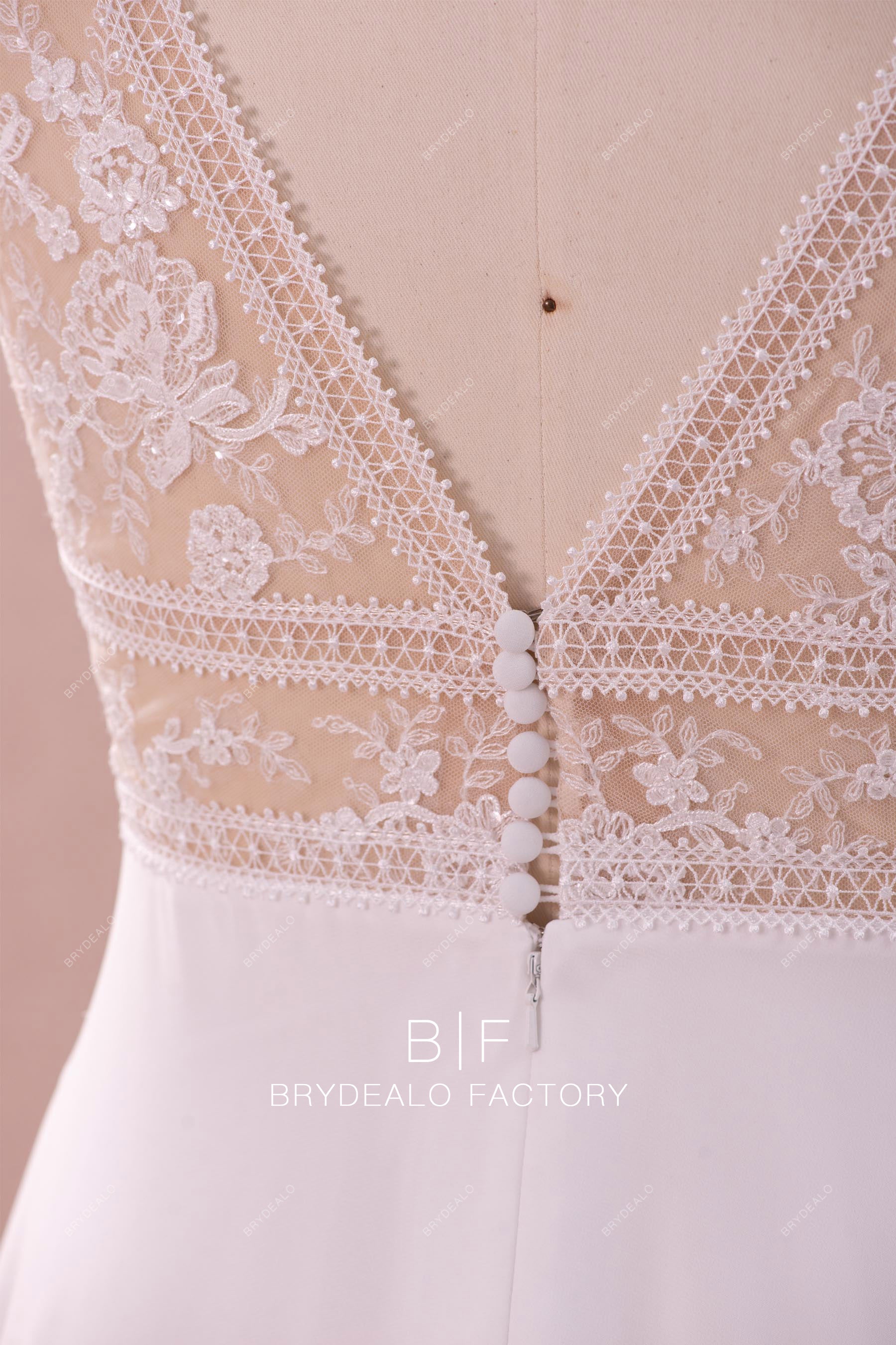 buttoned illusion back wedding dress