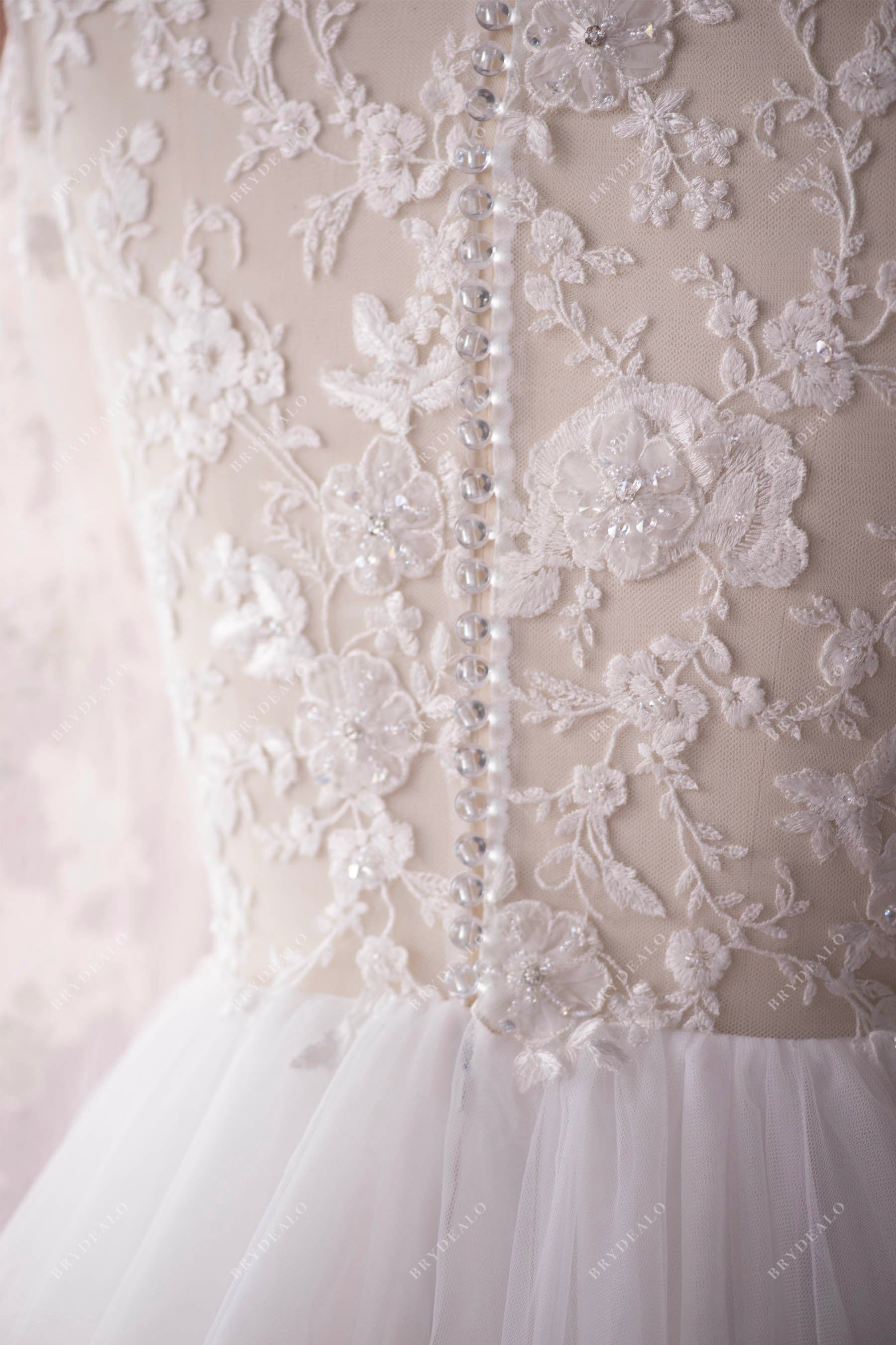 buttoned lace back wedding dress