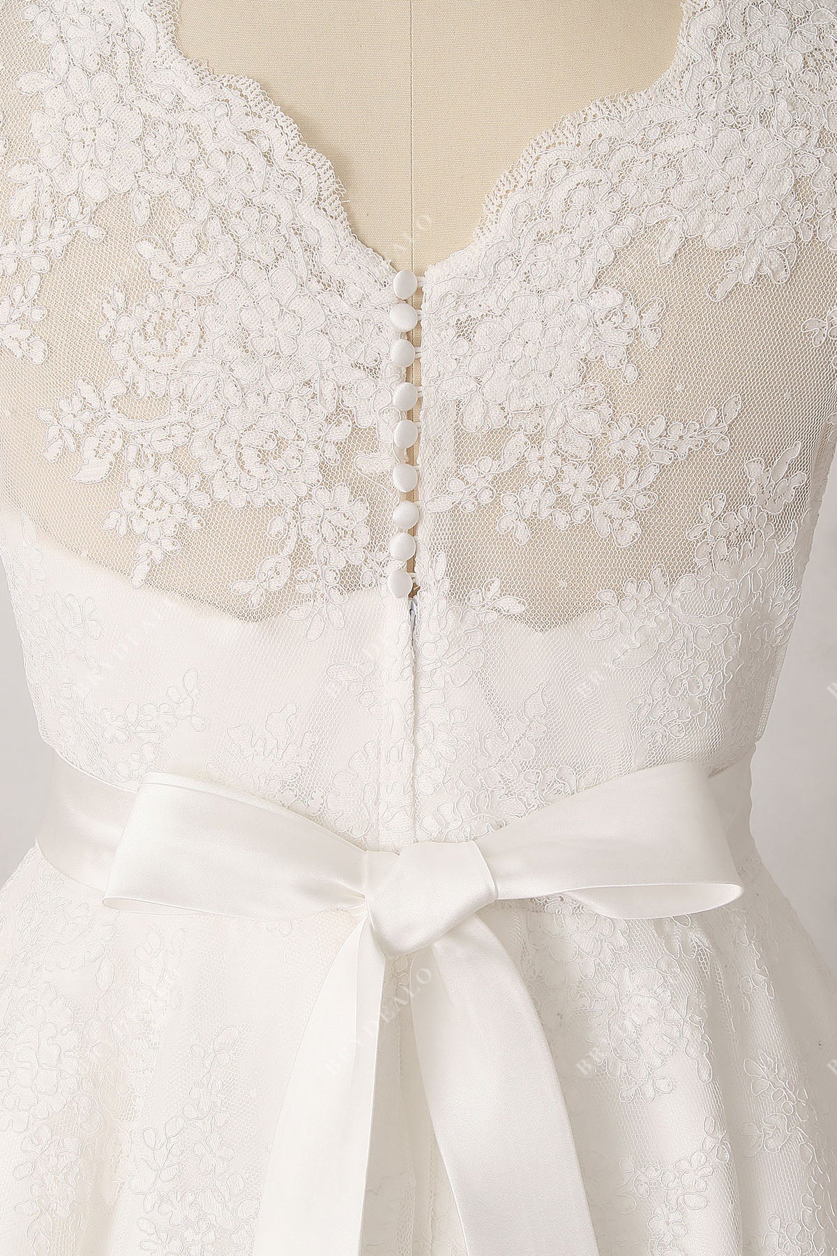 buttons decorated illusion back bridal dress