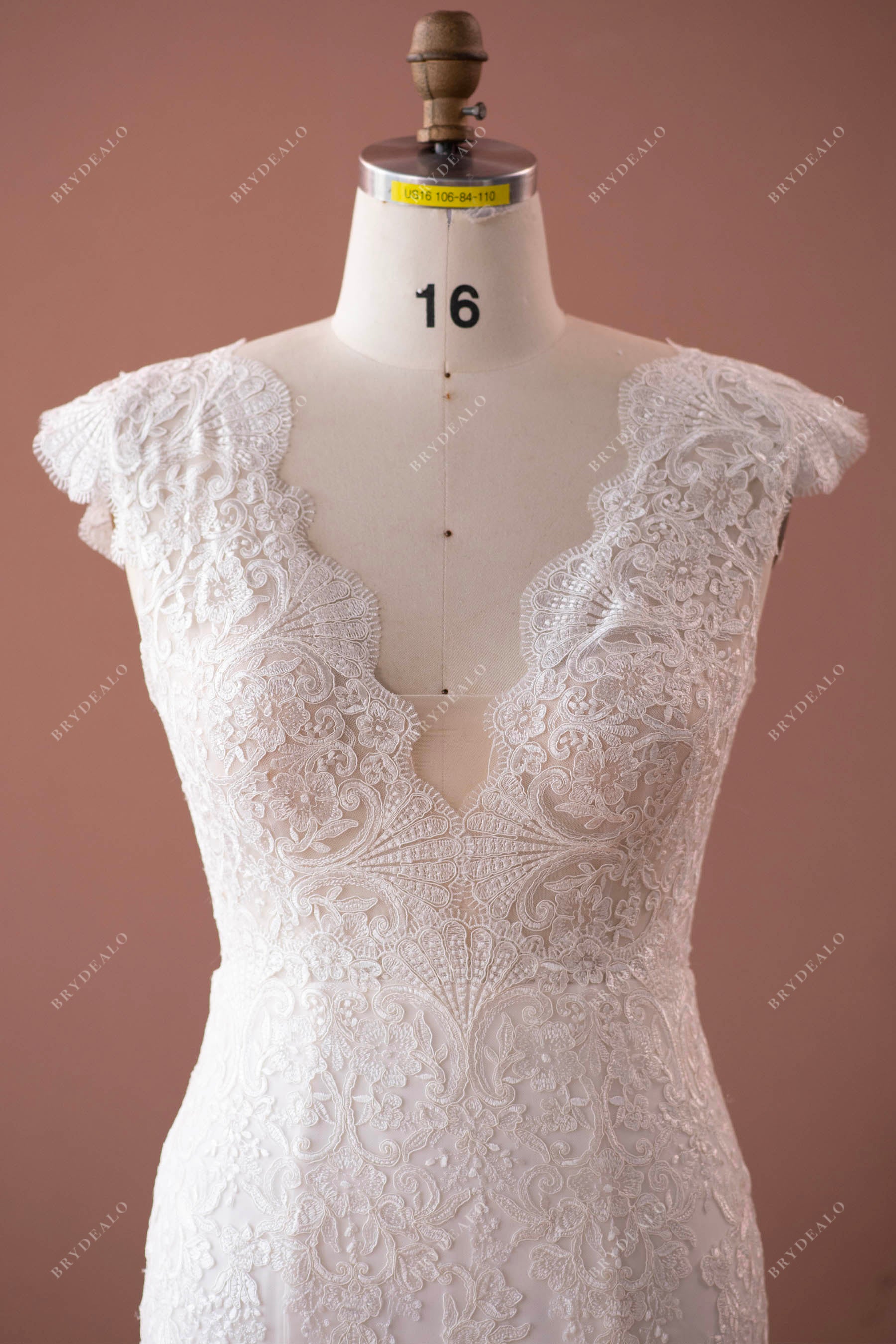 cap sleeve plunging lace wedding dress