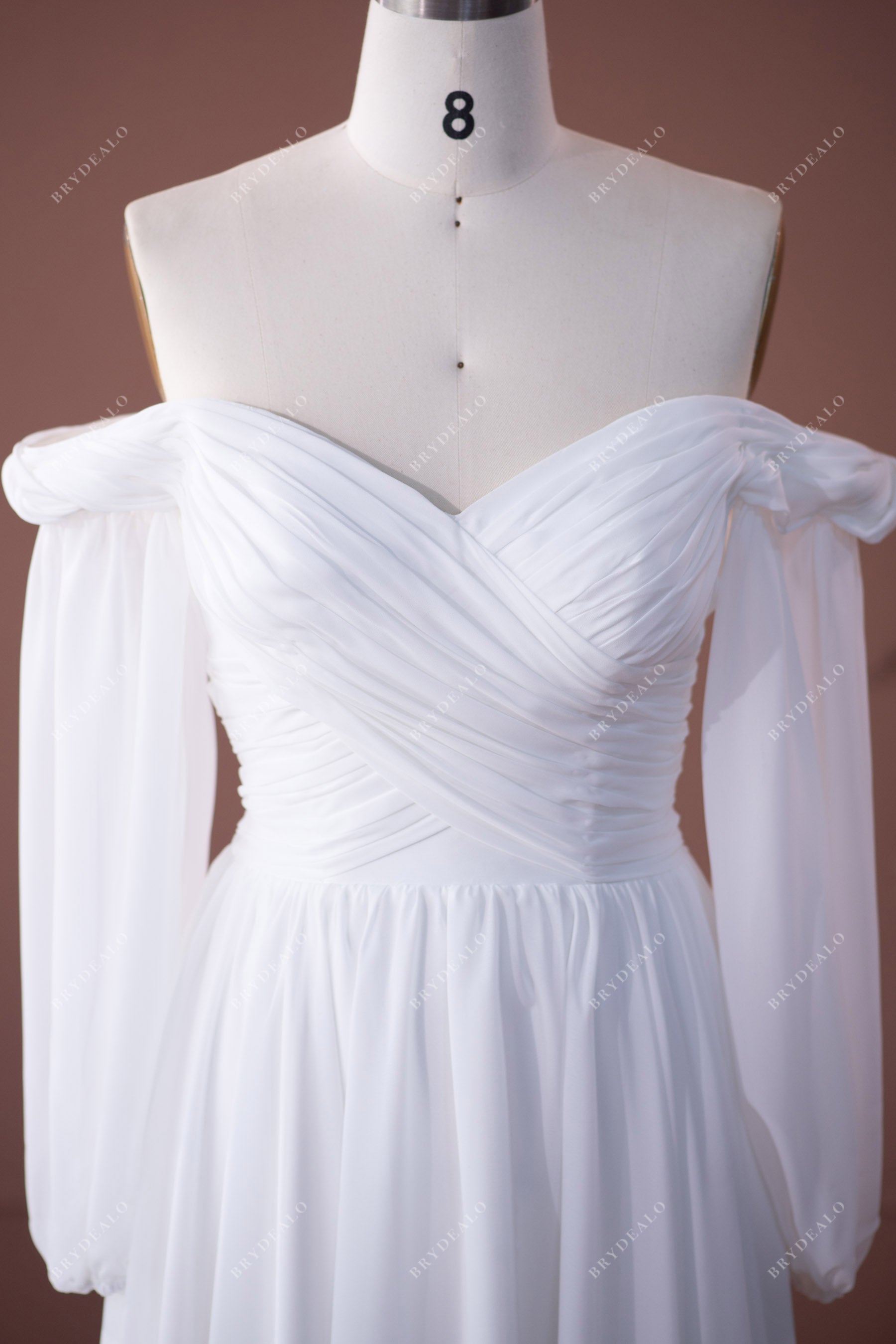 off shoulder crisscross pleated bridal gown