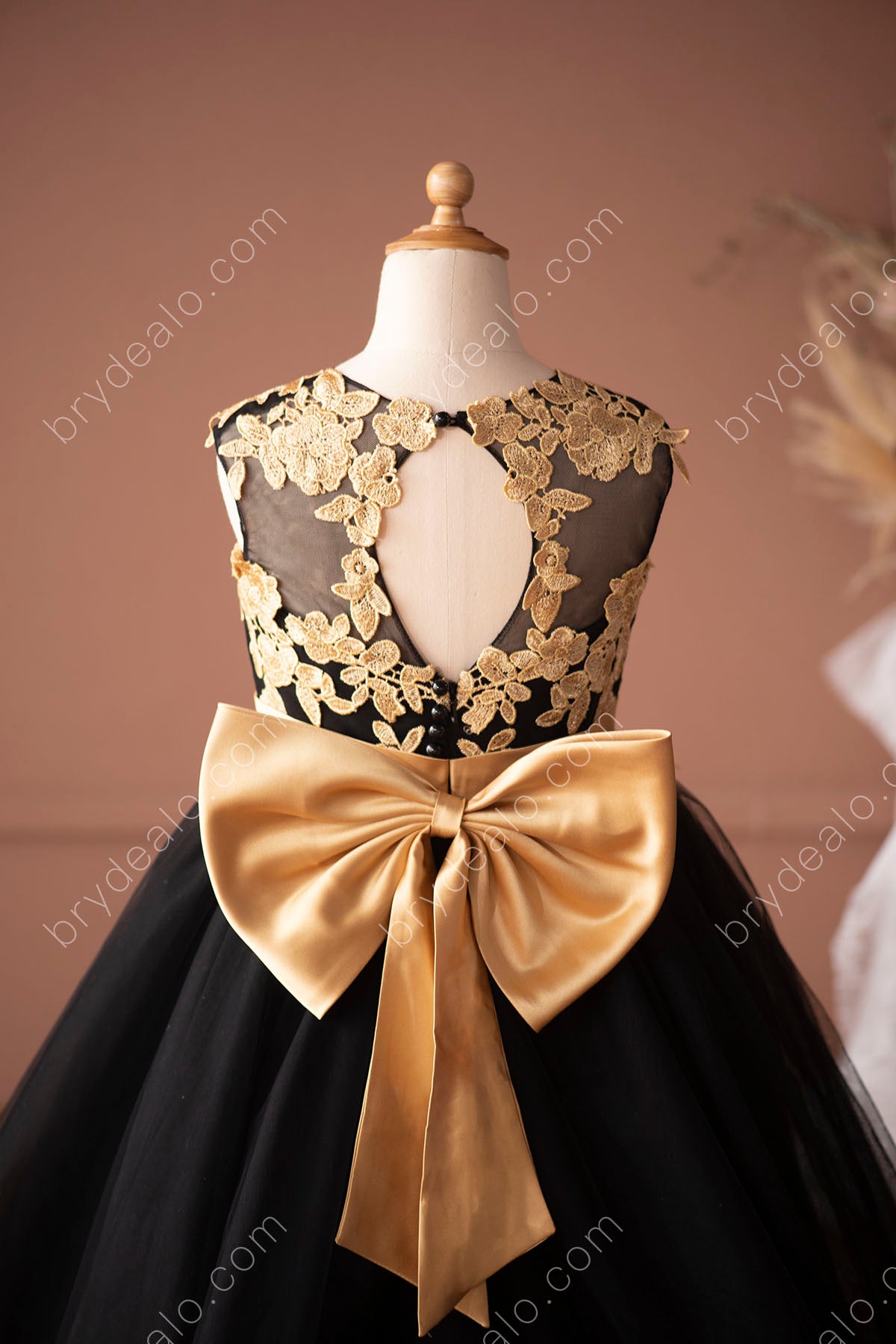 gold bownot-black flower girl ball gown