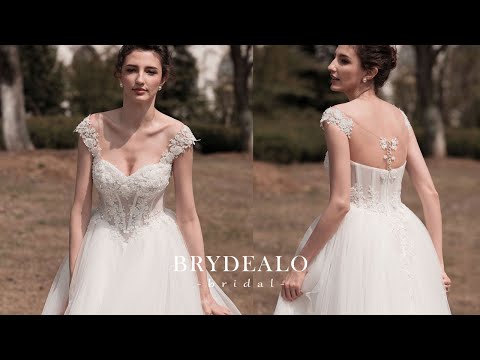 Cap Sleeve Beaded Lace Puffy A-line Wedding Dress for Wholesale