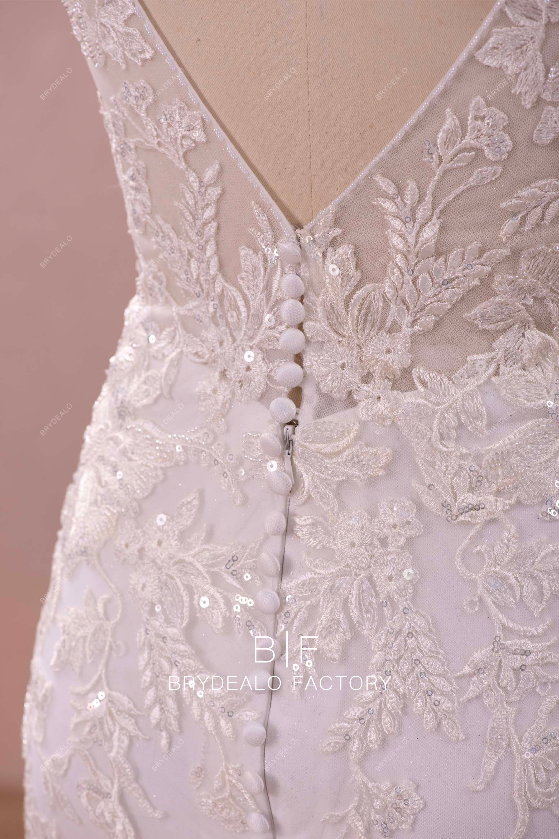 illusion buttoned back bridal gown