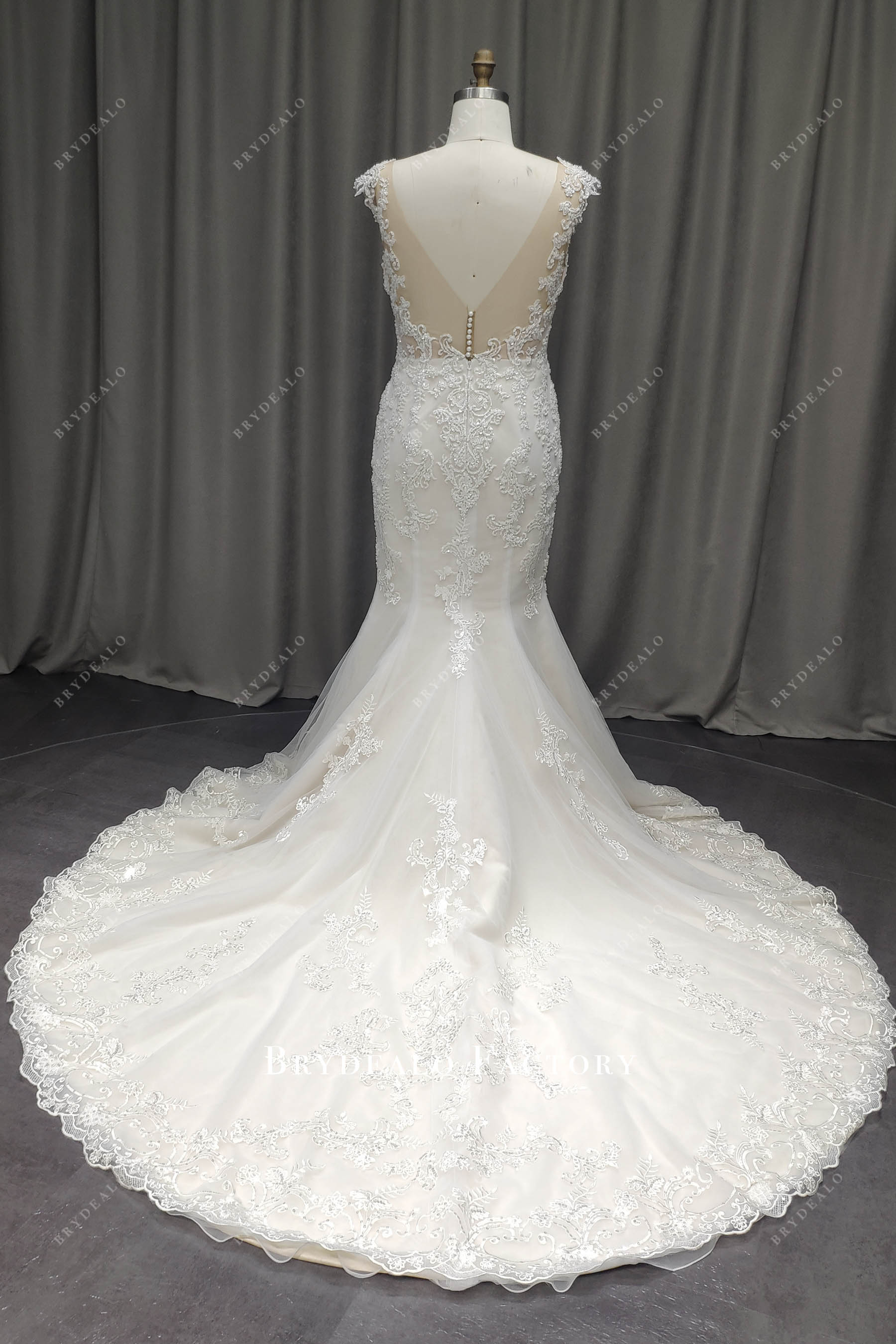 illusion buttoned back long lace mermaid wedding gown