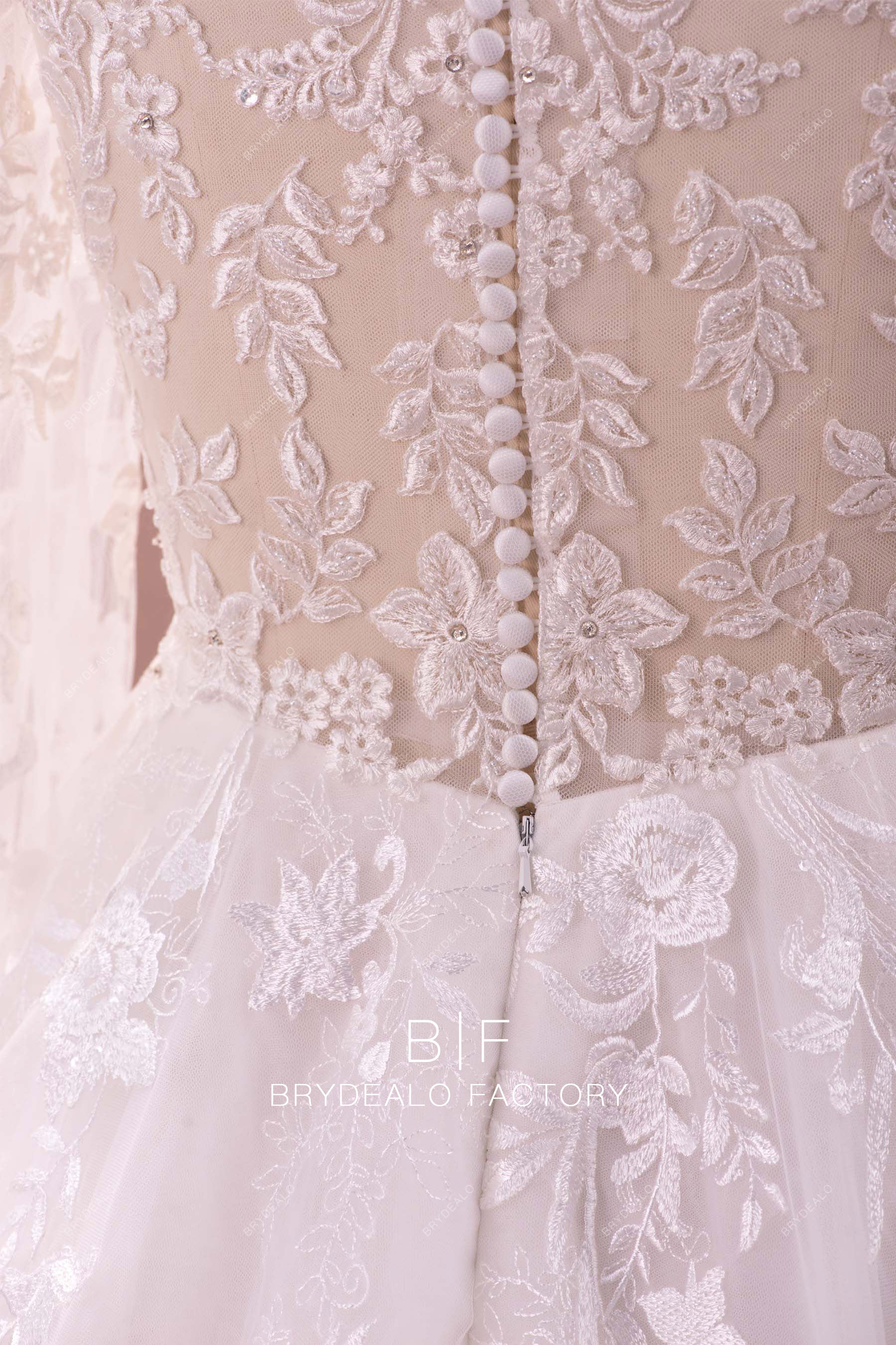 illusion buttoned closure back wedding gown
