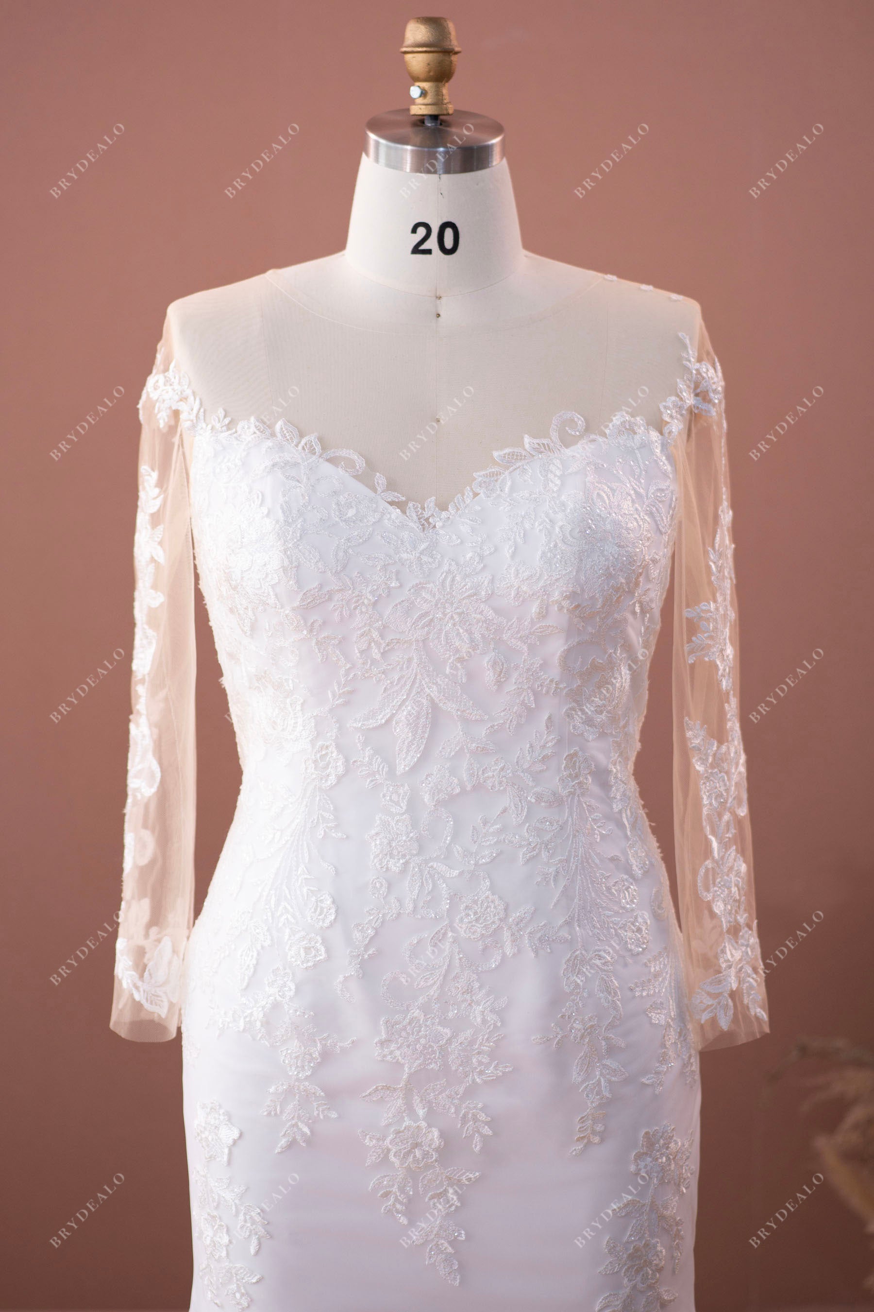 illusion neck lace appliqued sleeved wedding gown