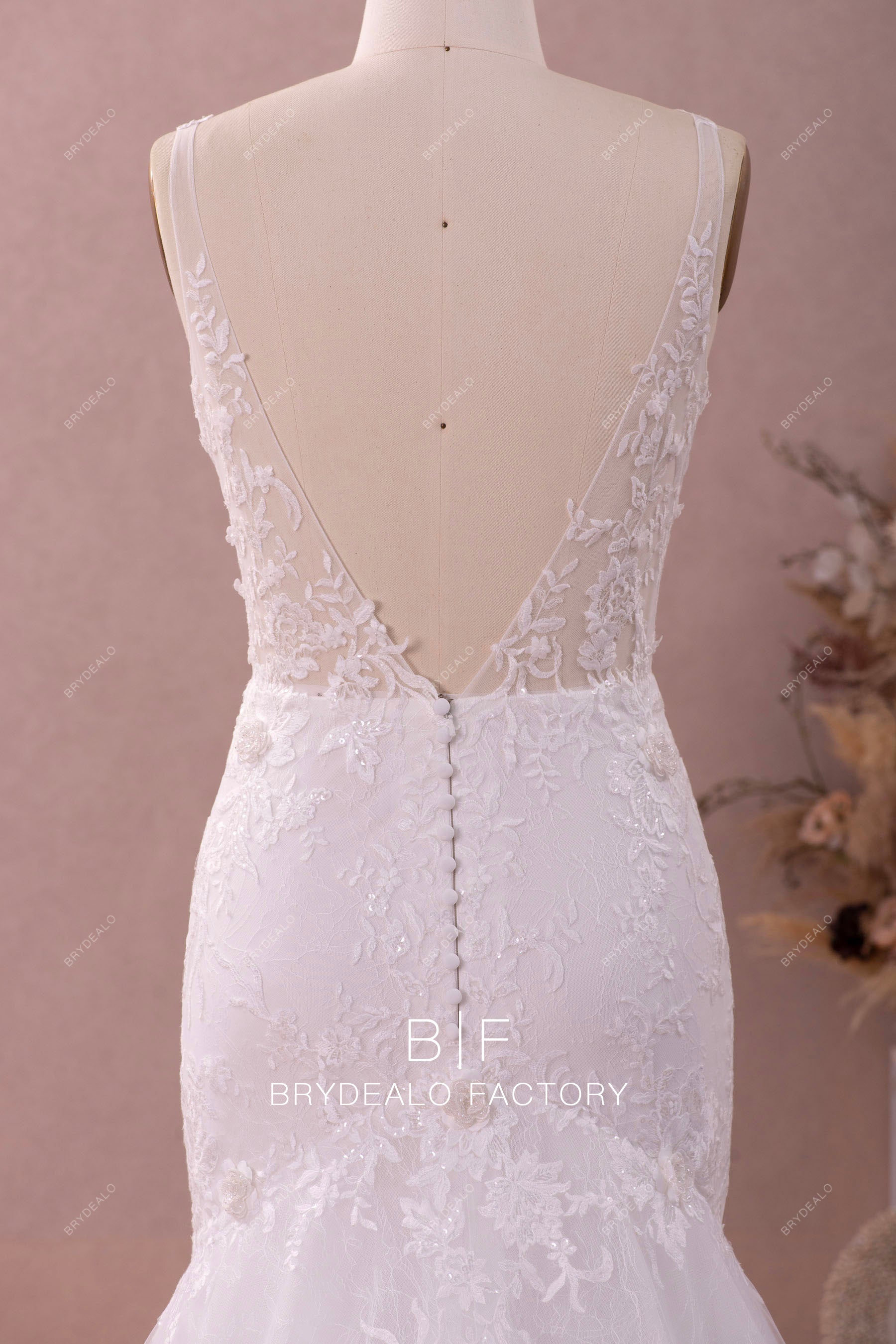 illusion v-cut buttoned bridal gown