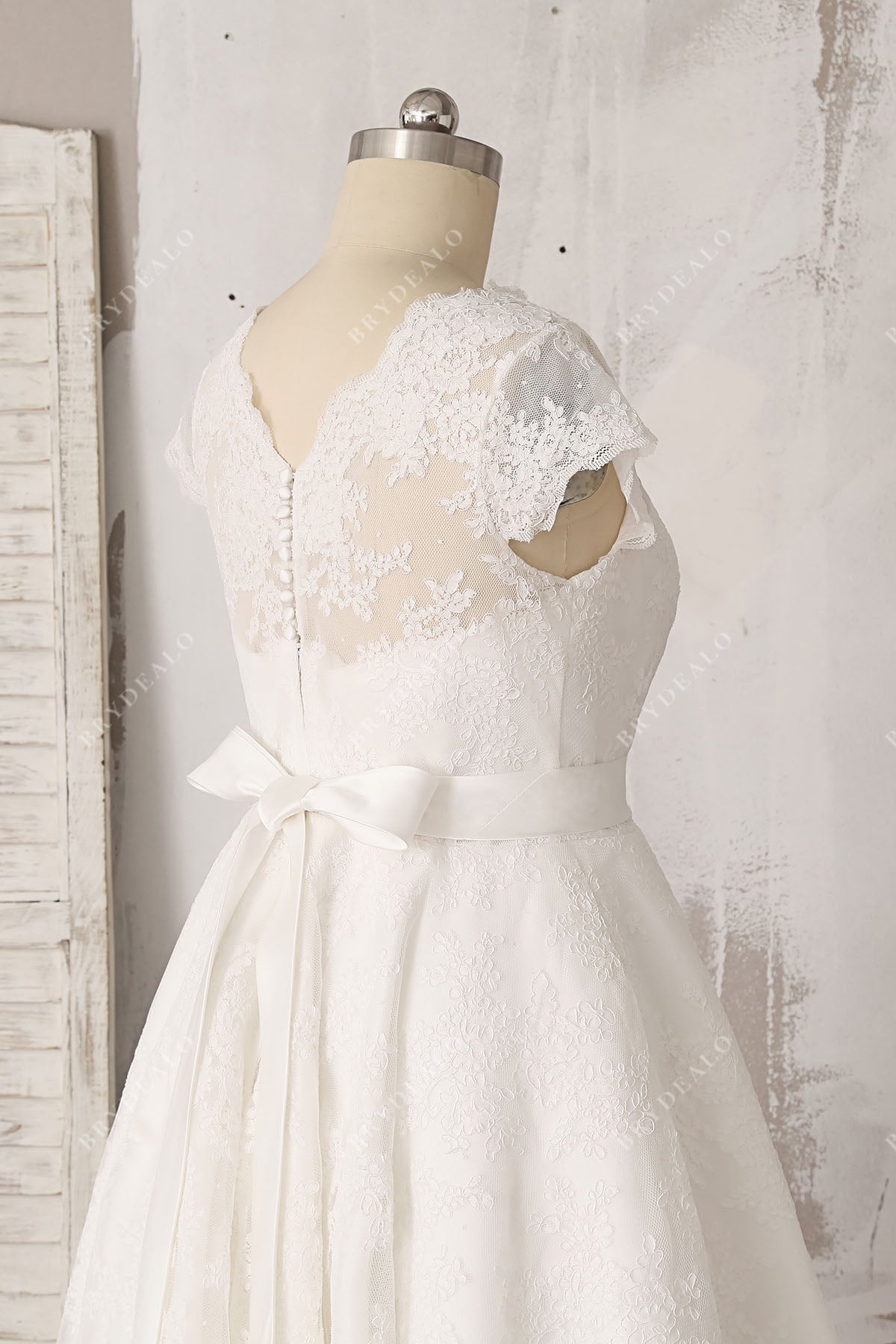 lace V-back cap sleeve bridal dress
