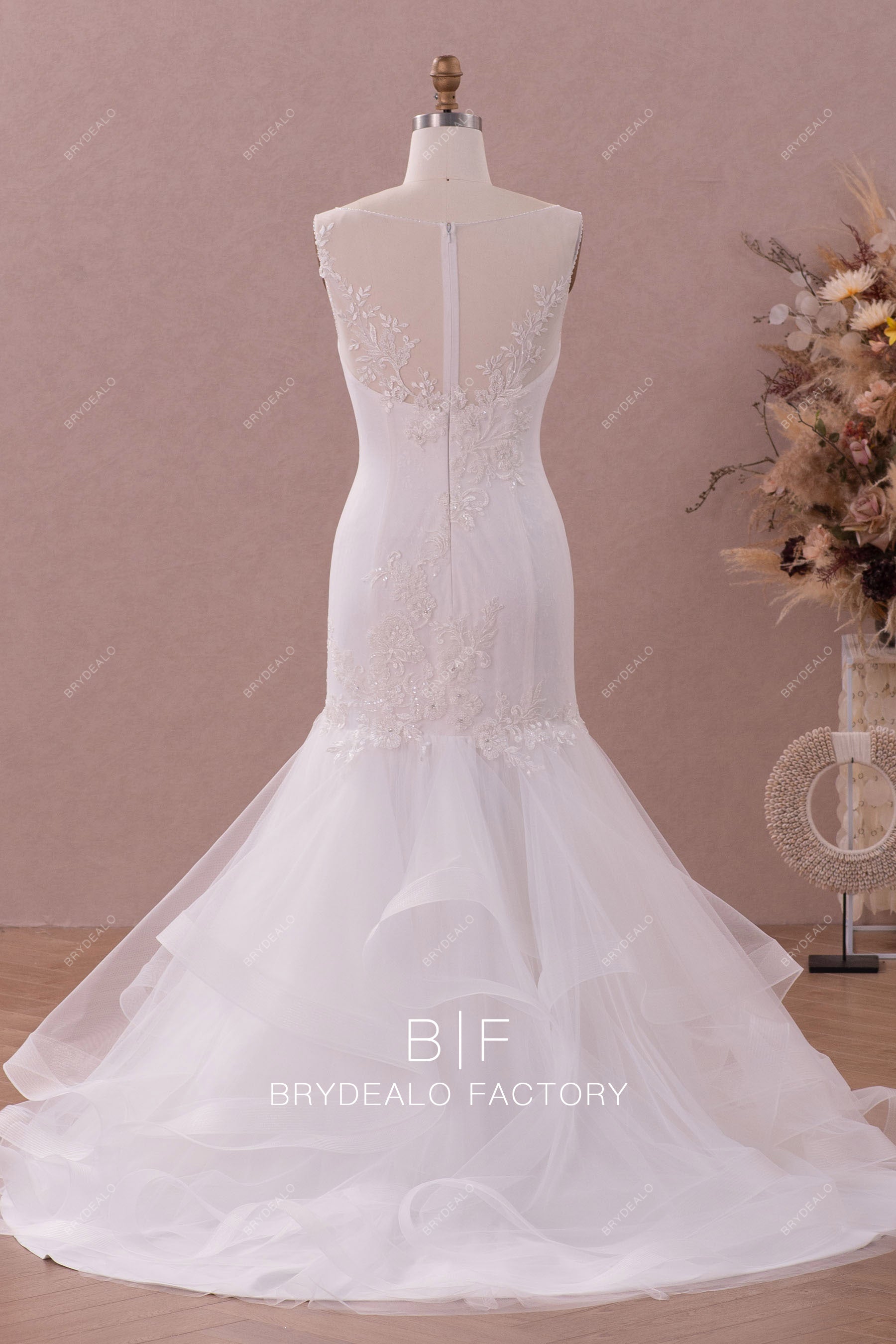 long ruffled train trumpet wedding gown