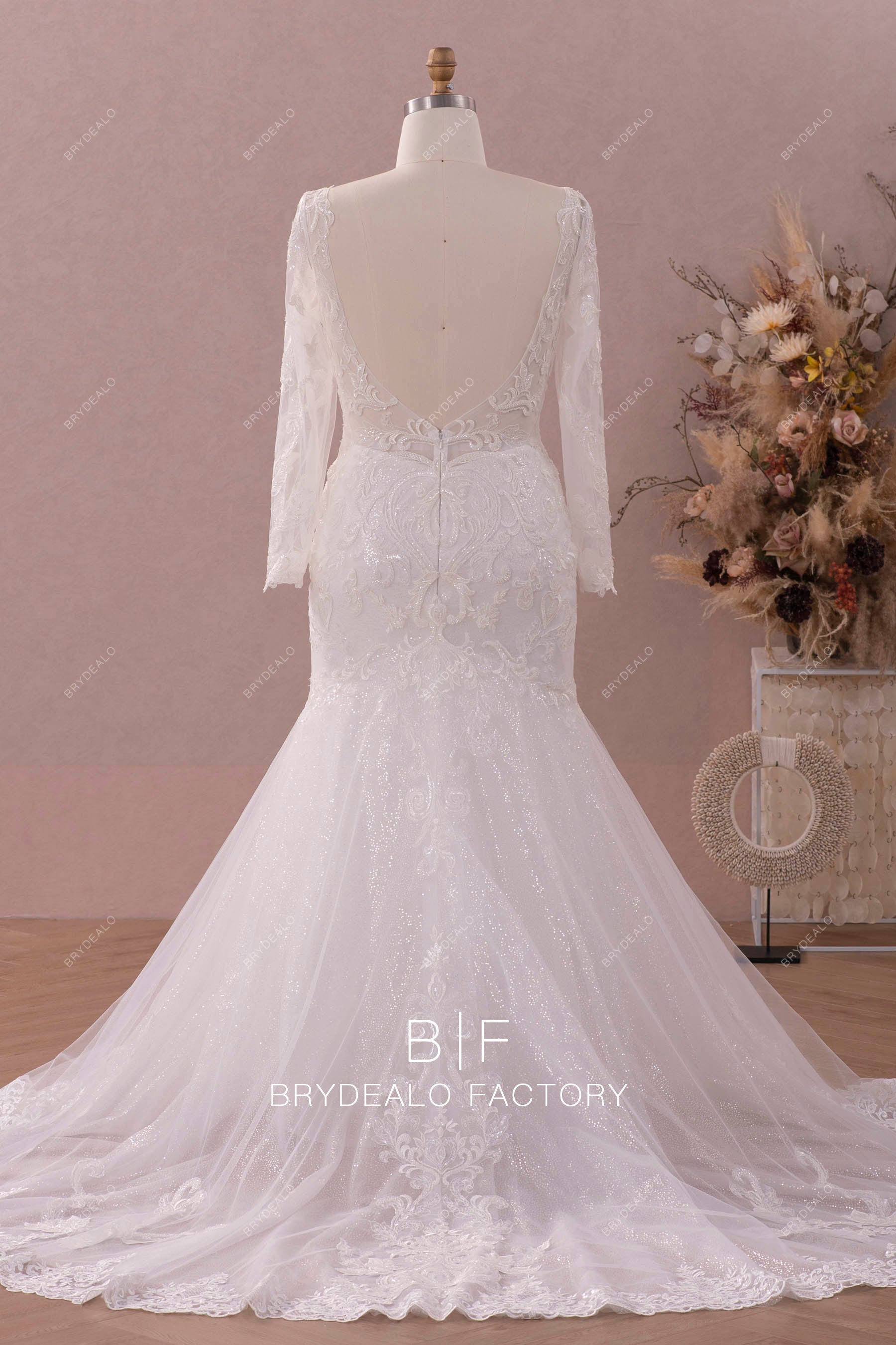 long sleeved plus size open back mermaid wedding gown