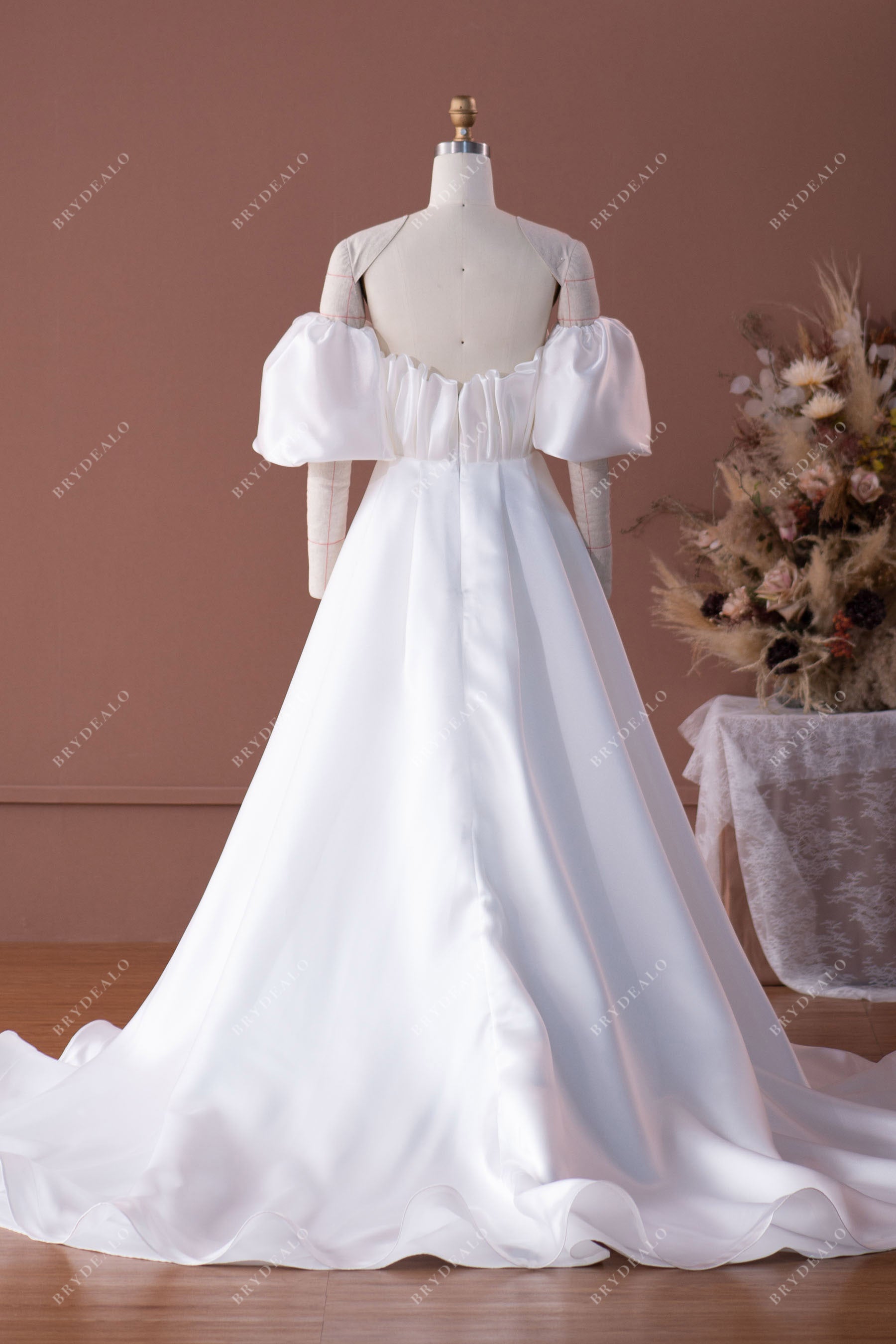 long train ruffled off-shoulder wedding gown