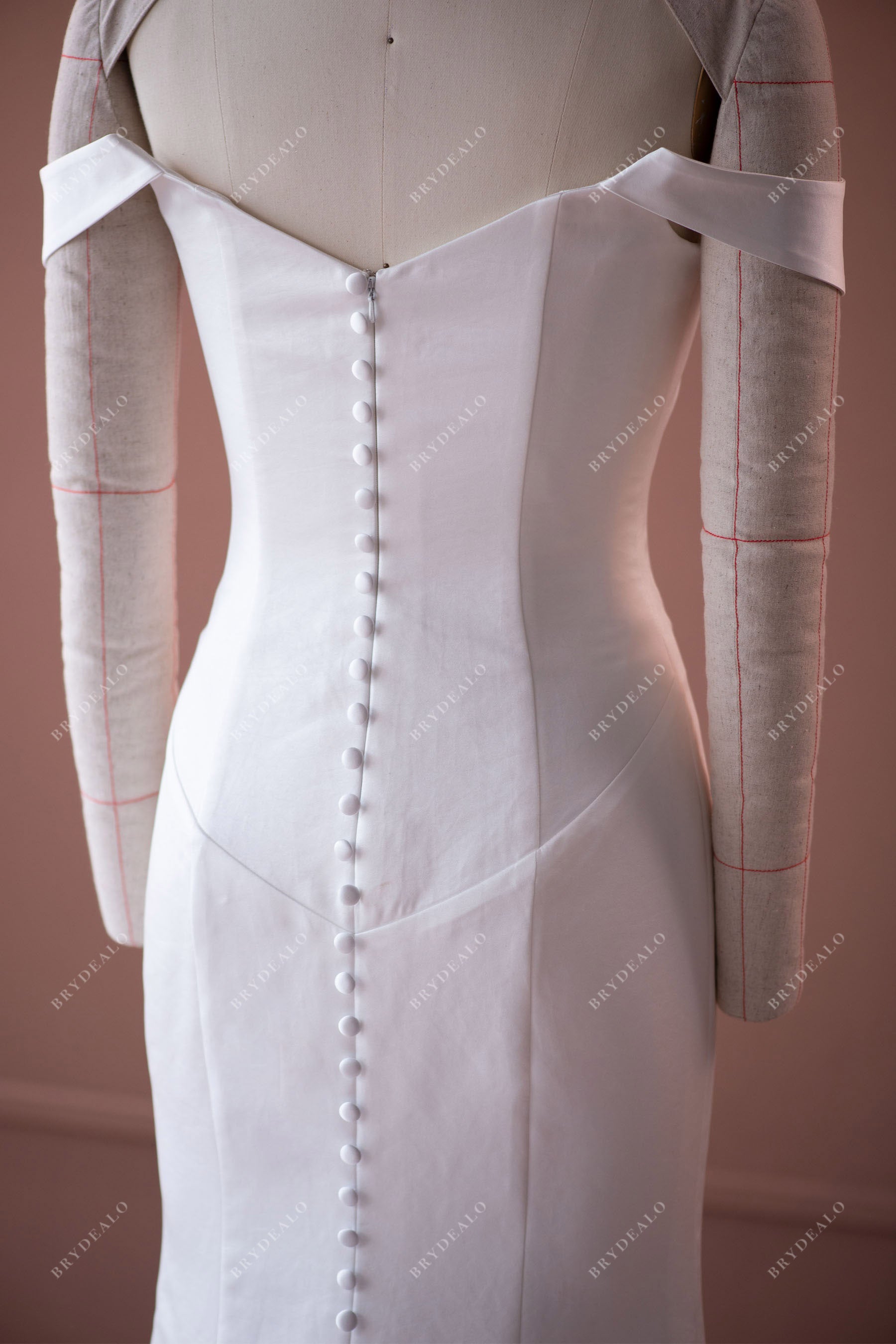 off shoulder buttoned back wedding dress