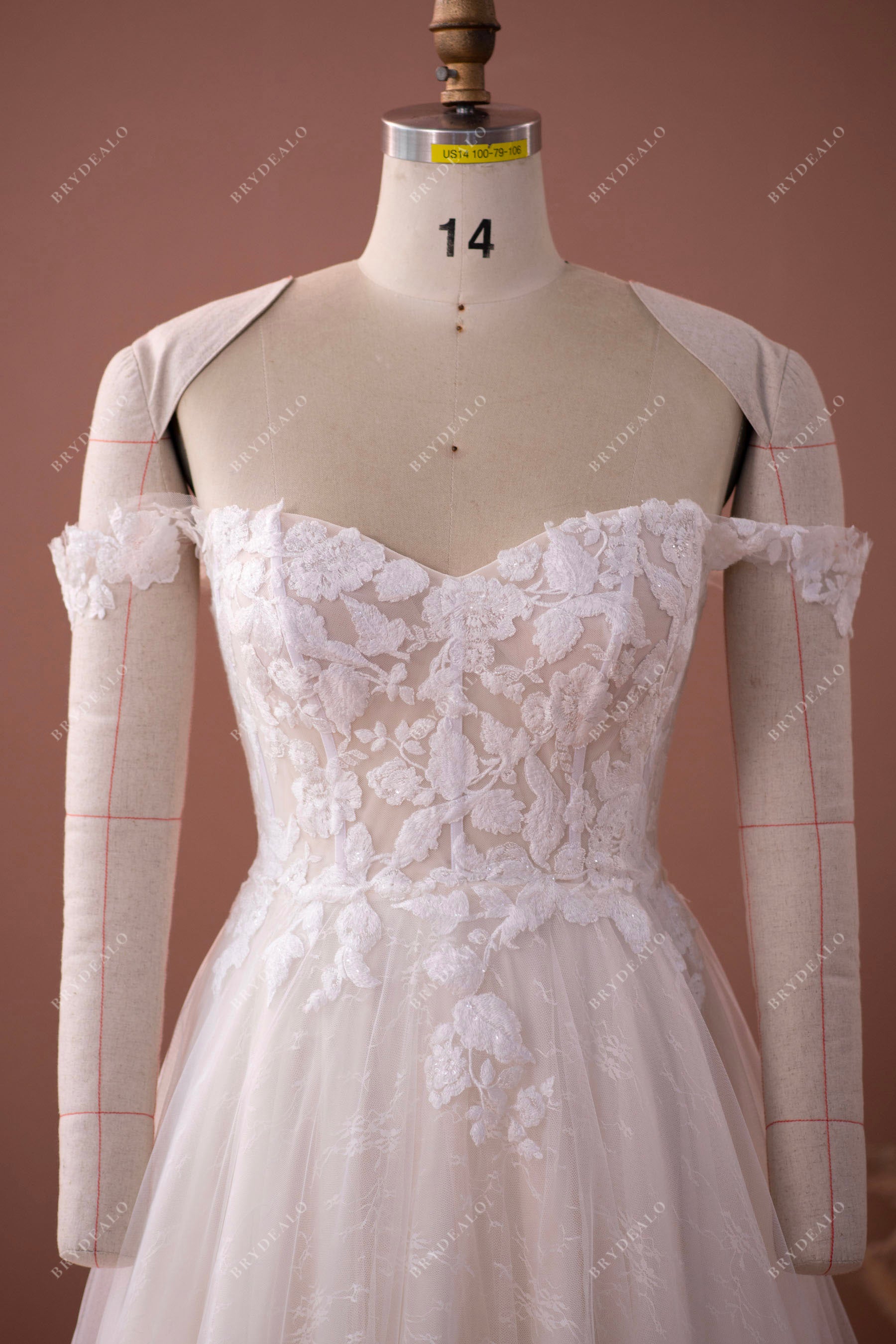 off shoulder lace exposed boning wedding gown