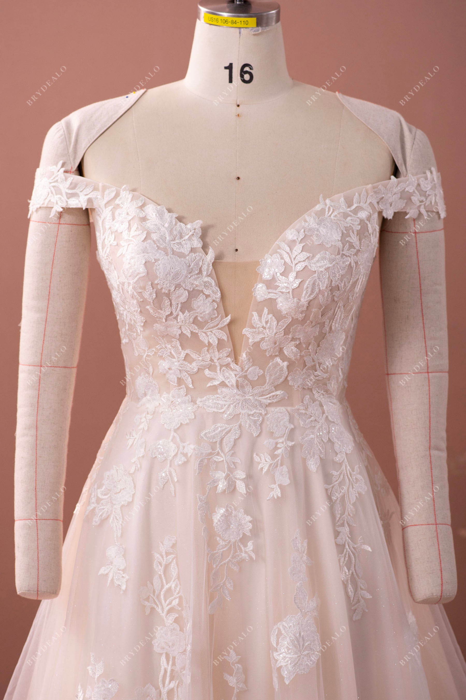 off shoulder plunging wedding dress