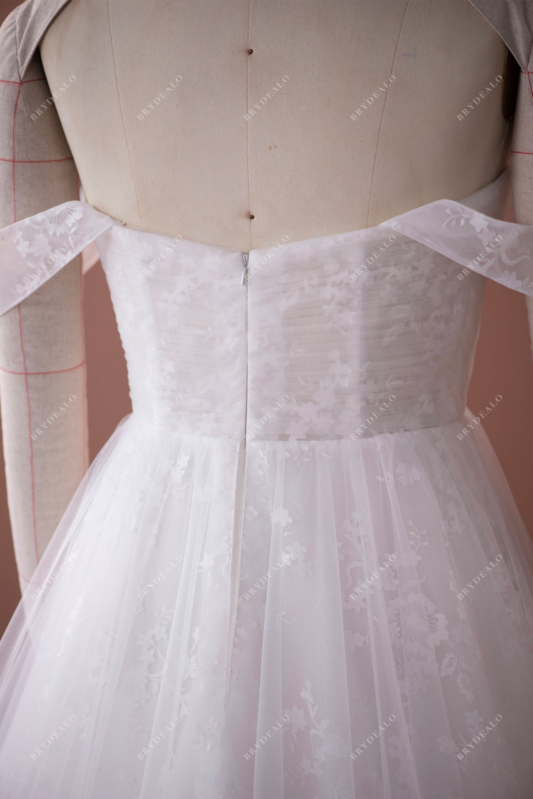 pleated off shoulder tulle overlaid lace wedding gown