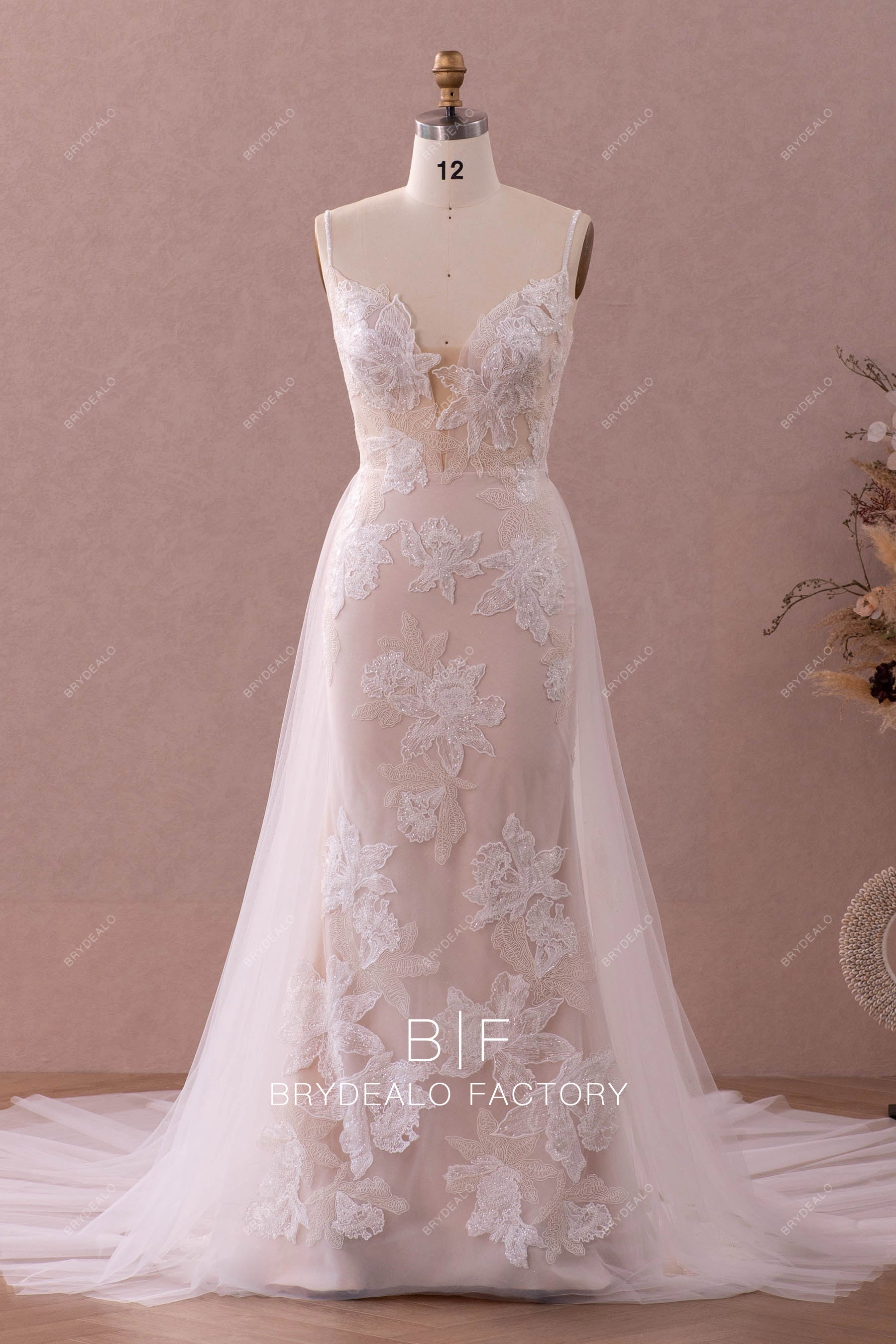plunging beaded lace wedding dress with overskirt sample