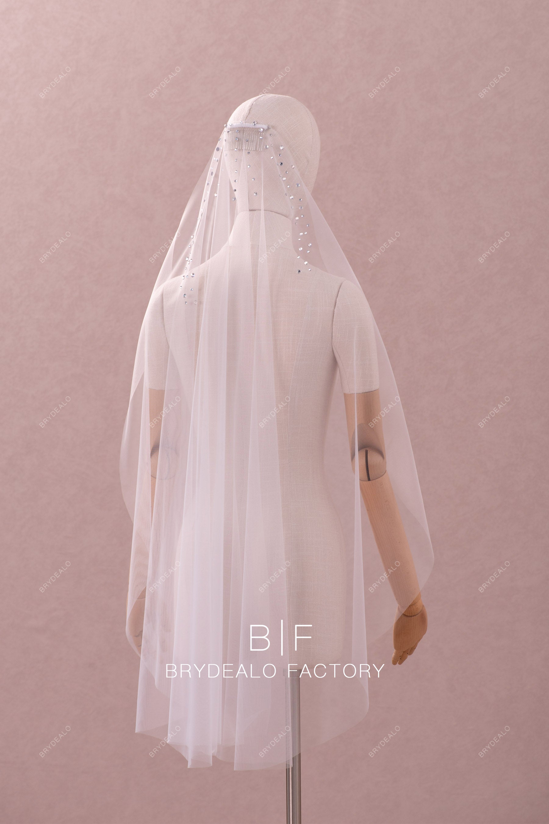 raw-cut fingertip length bridal veil