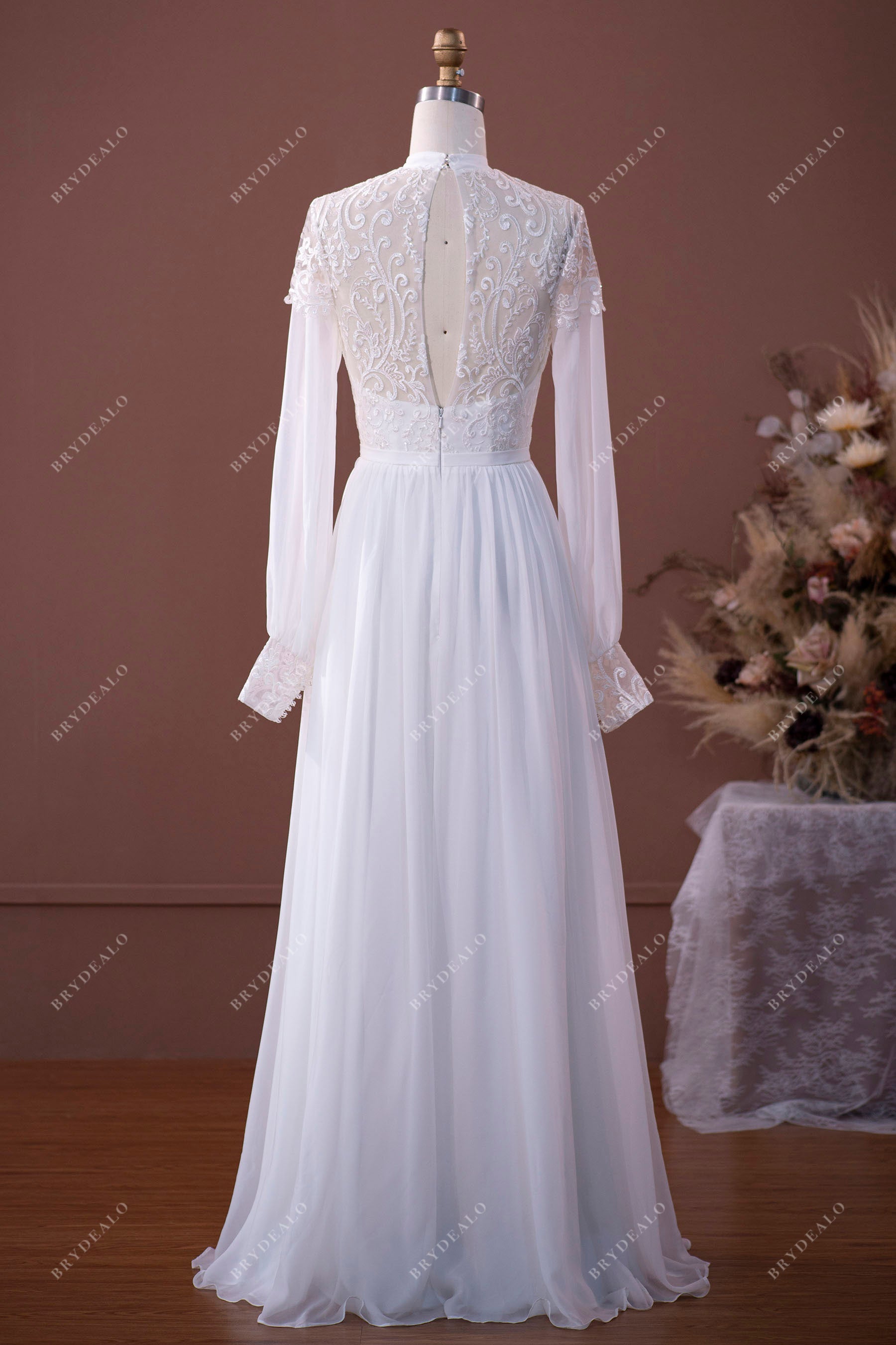 lace keyhole illusion back floor length bridal gown