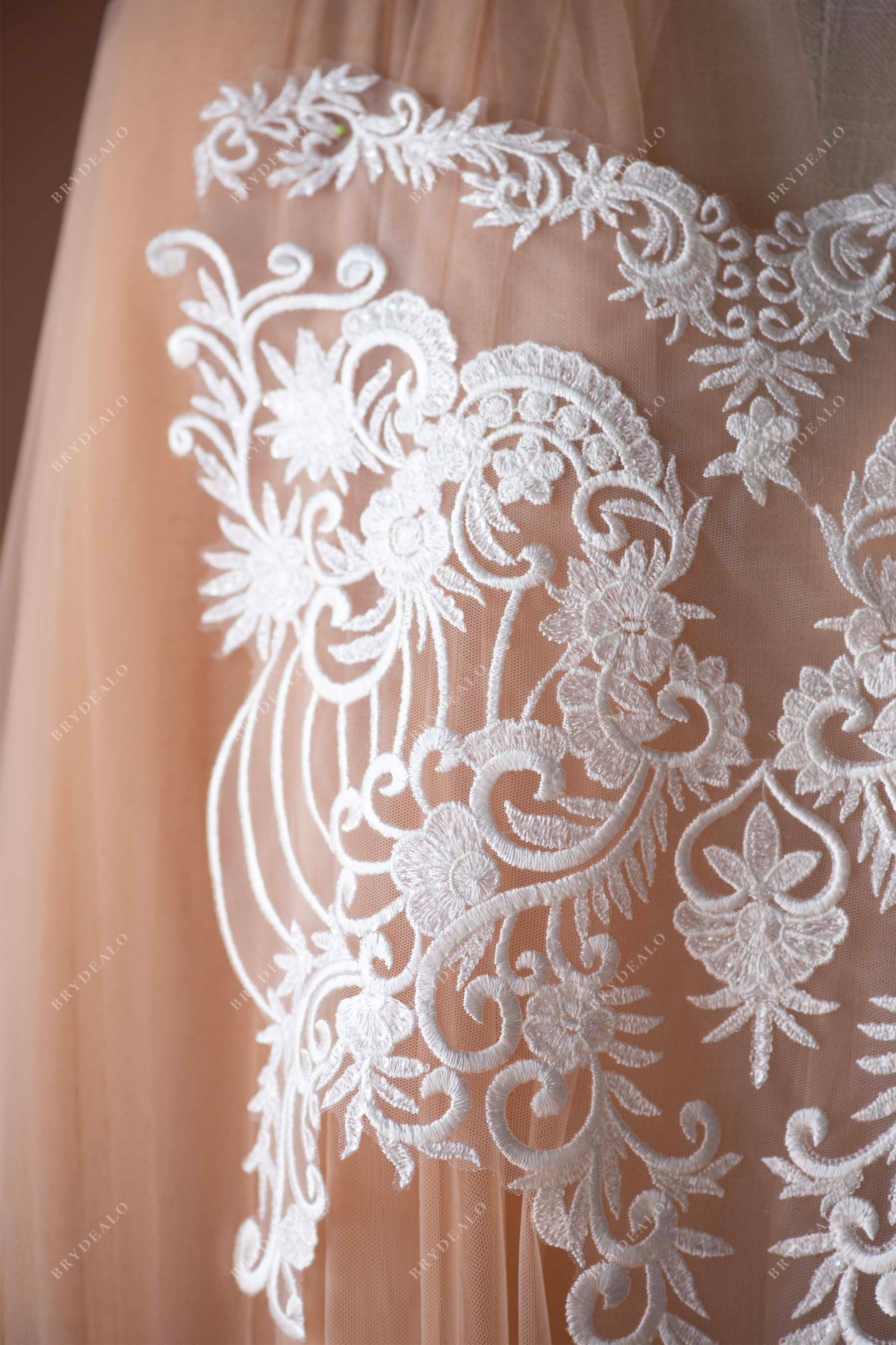 symmetrical lace applique for designer bridal dress