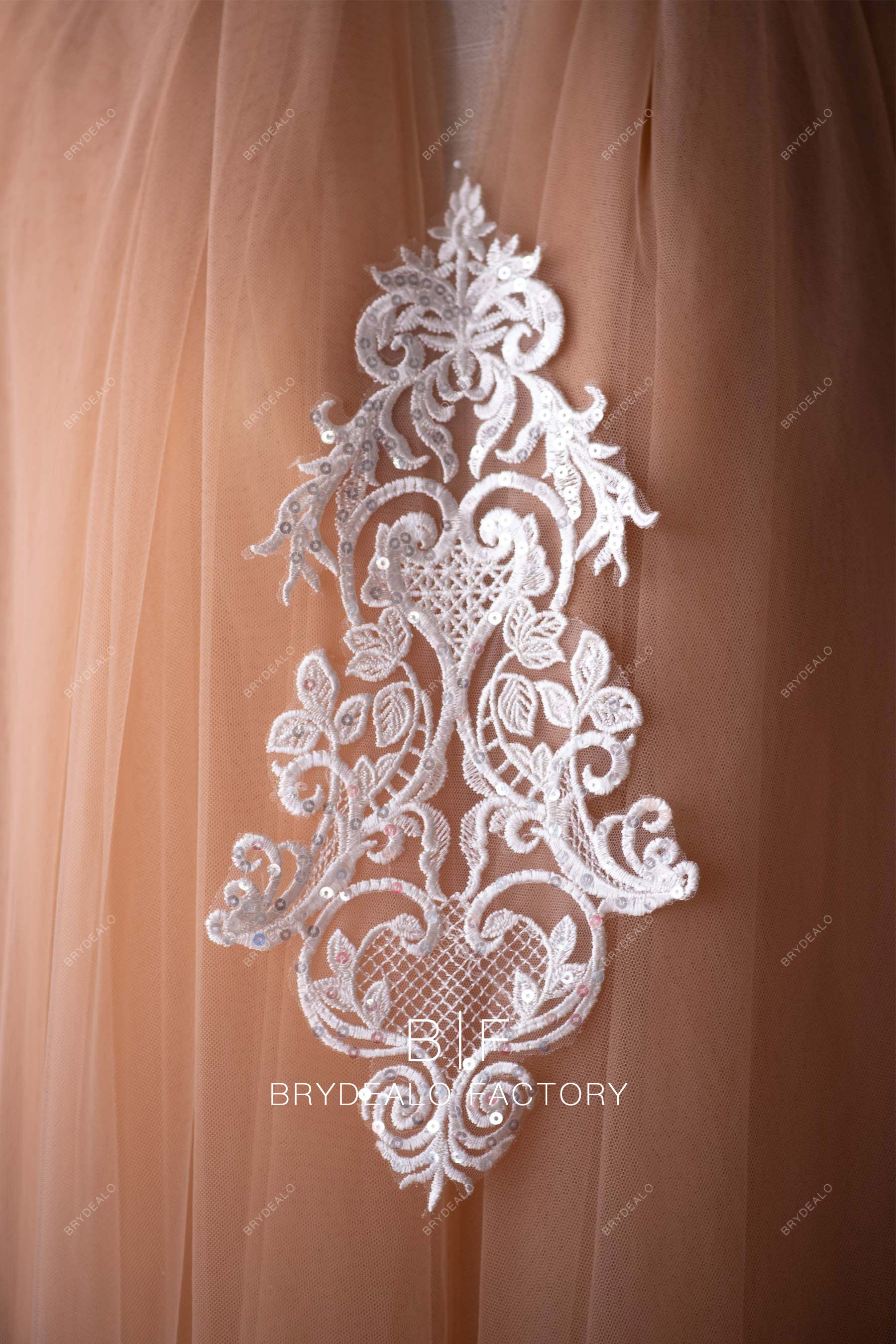 totem pattern lace applique