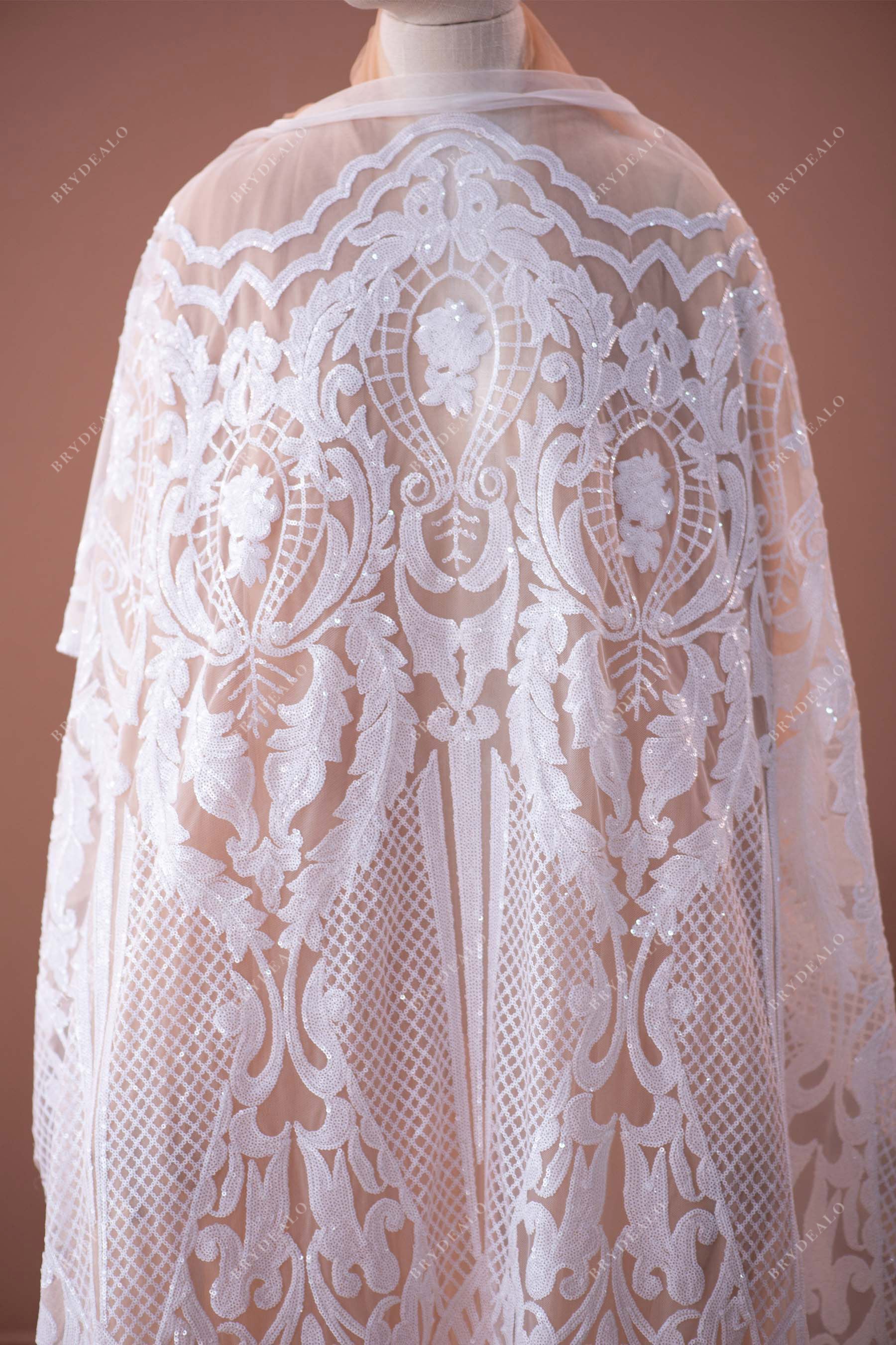 white patterned sequined lace fabric for wholesale