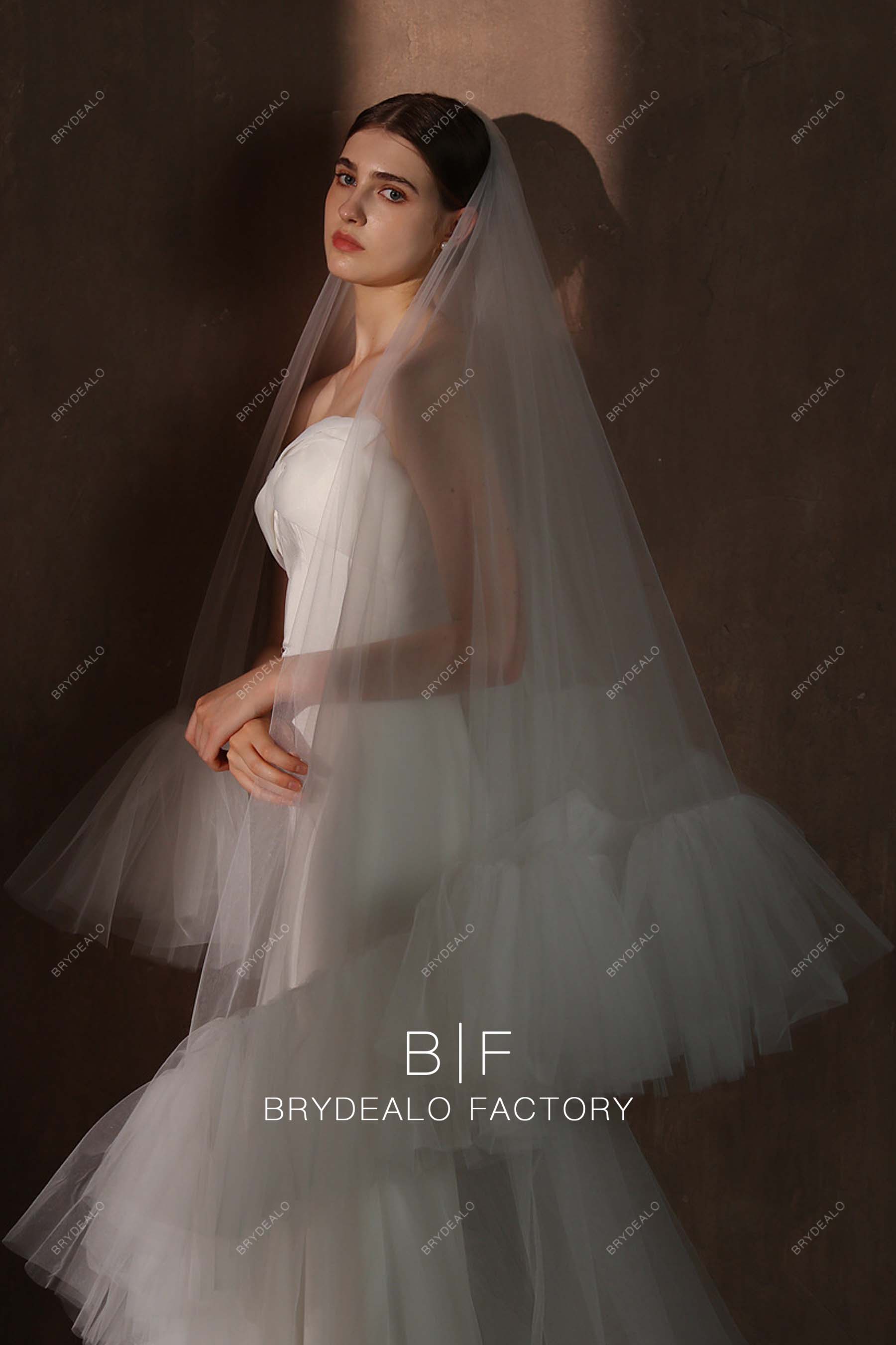 https://brydealofactory.com/cdn/shop/files/Ruffled-Edge-Wedding-Veil-08171.jpg?v=1697006635&width=1800