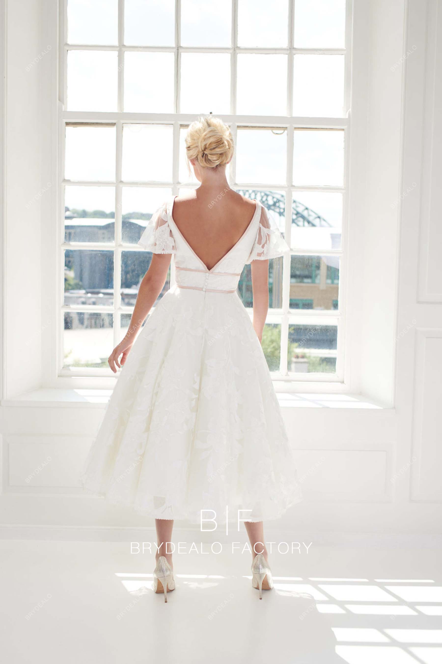 V-back flutter sleeves vintage bridal dress